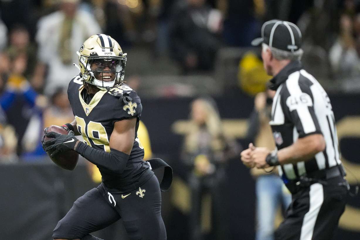 New Orleans Saints wide receiver Rashid Shaheed (89) looks over his shoulder as he runs in for a touchdown against the Atlanta Falcons in the first half of an NFL football game in New Orleans, Sunday, Dec. 18, 2022.