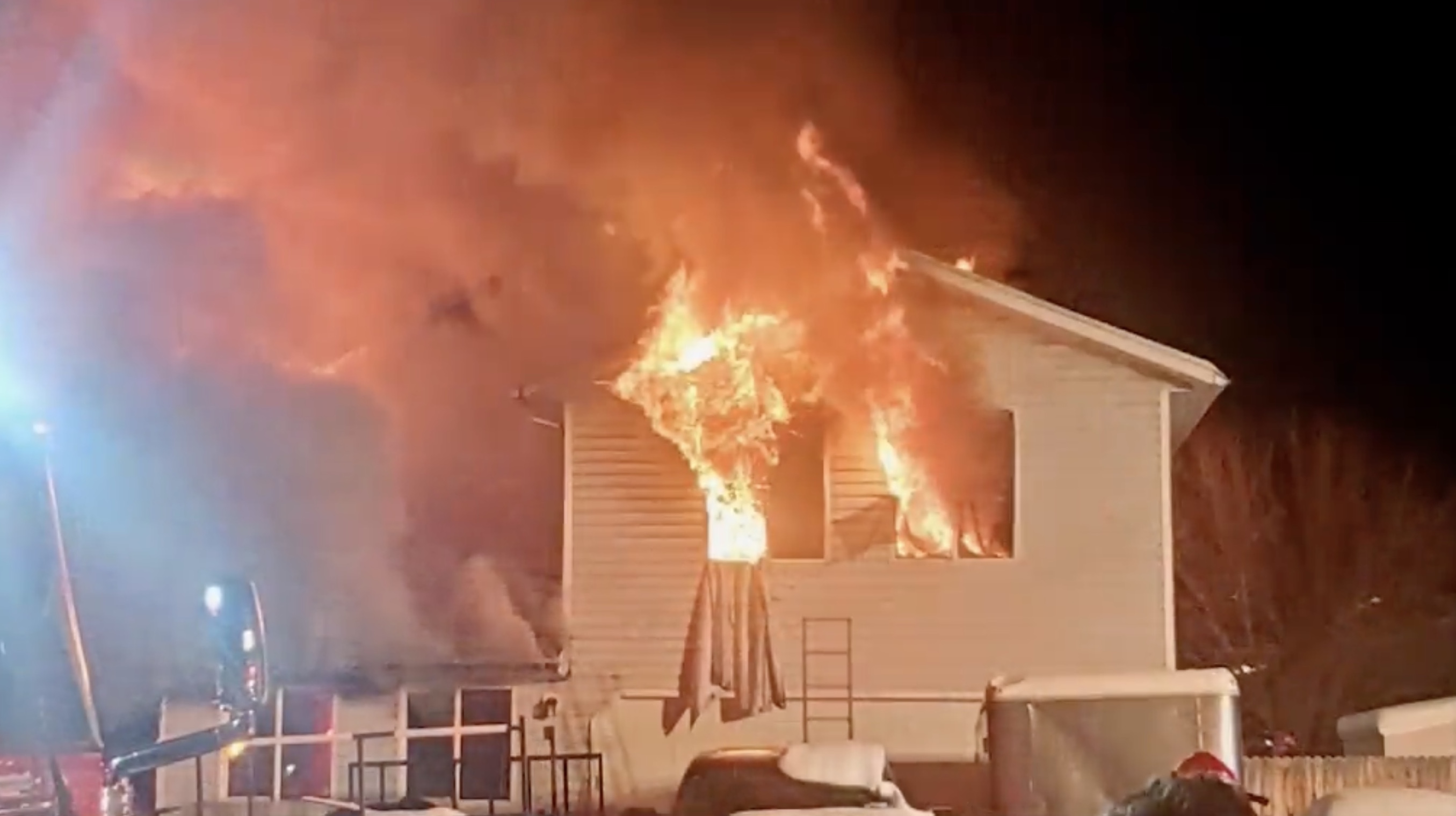 Several neighbors are being credited for helping to save the lives of a Taylorsville family after their home went up in flames Monday night.