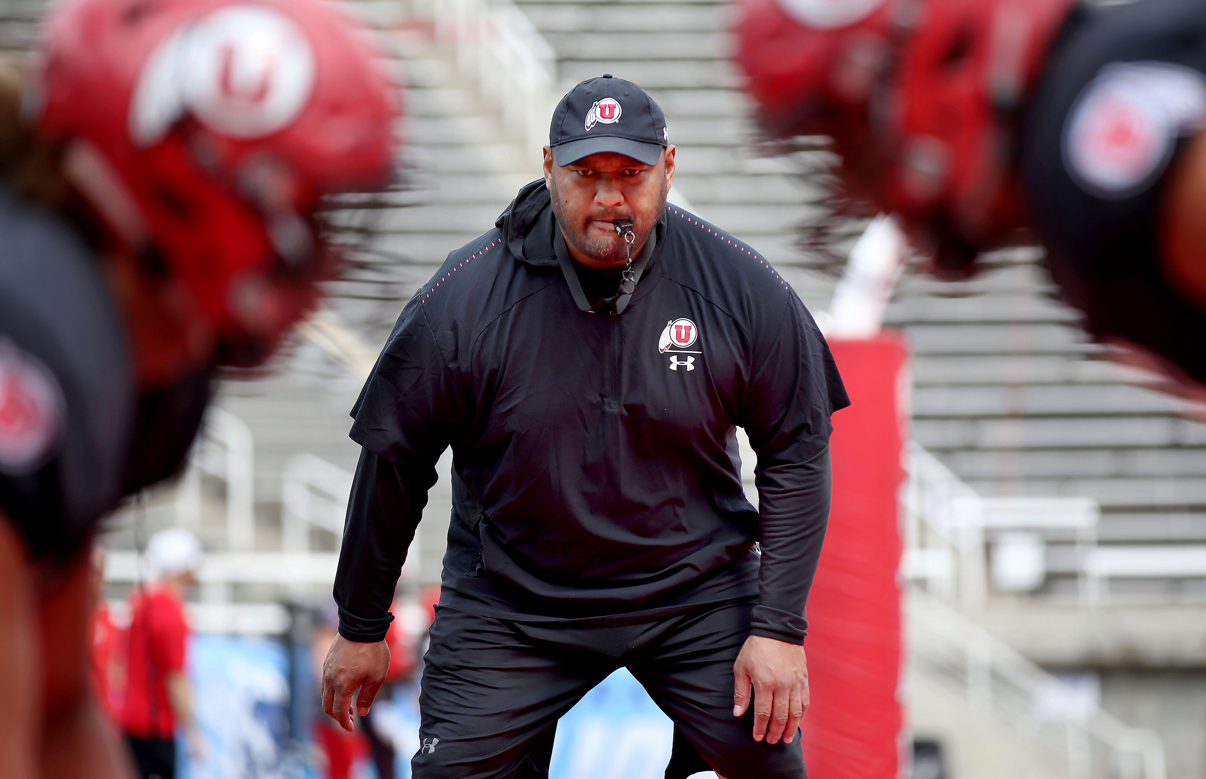 Sione Po'uha coaches during a practice at Rice-Eccles Stadium in Salt Lake City on Friday, April 5, 2019. Po'uha was hired as a defensive assistant at BYU on Tuesday.