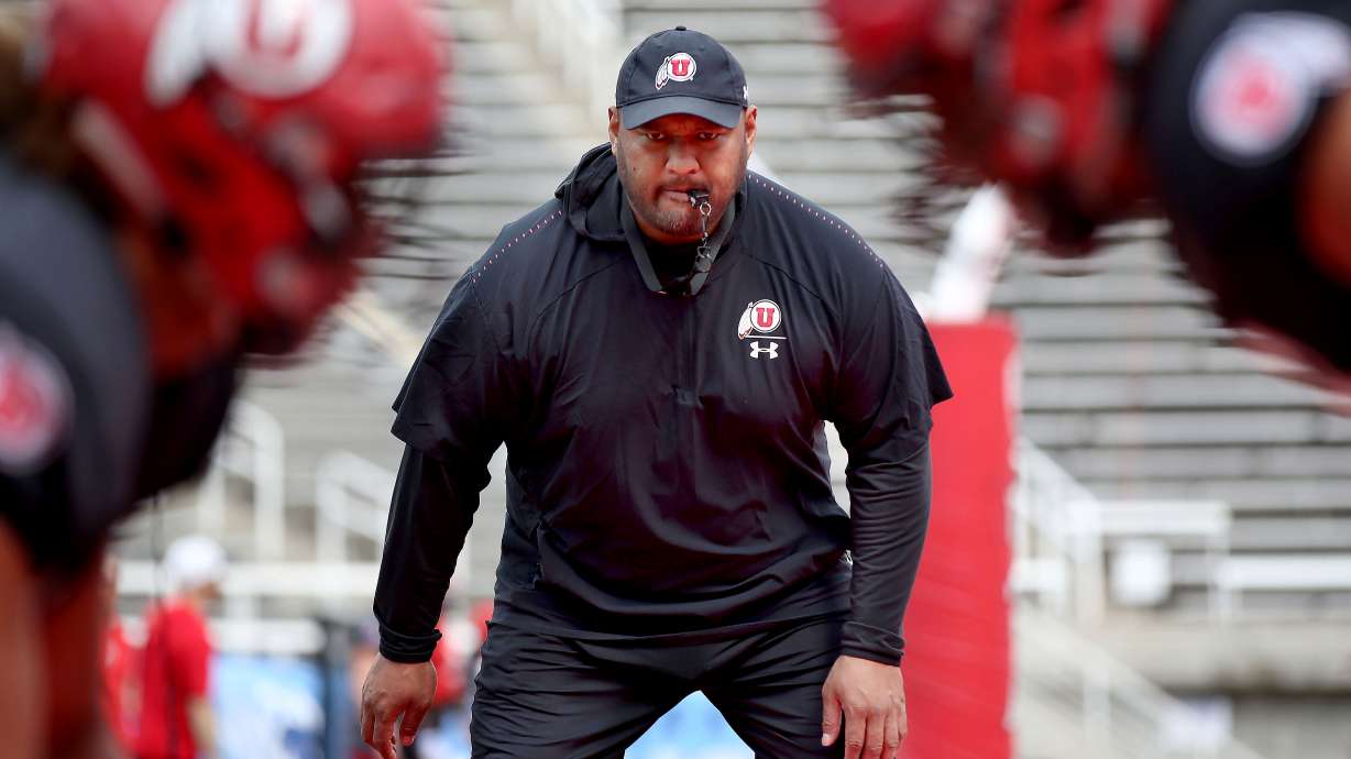 Sione Po'uha coaches during a practice at Rice-Eccles Stadium in Salt Lake City on Friday, April 5, 2019. Po'uha was hired as a defensive assistant at BYU on Tuesday.