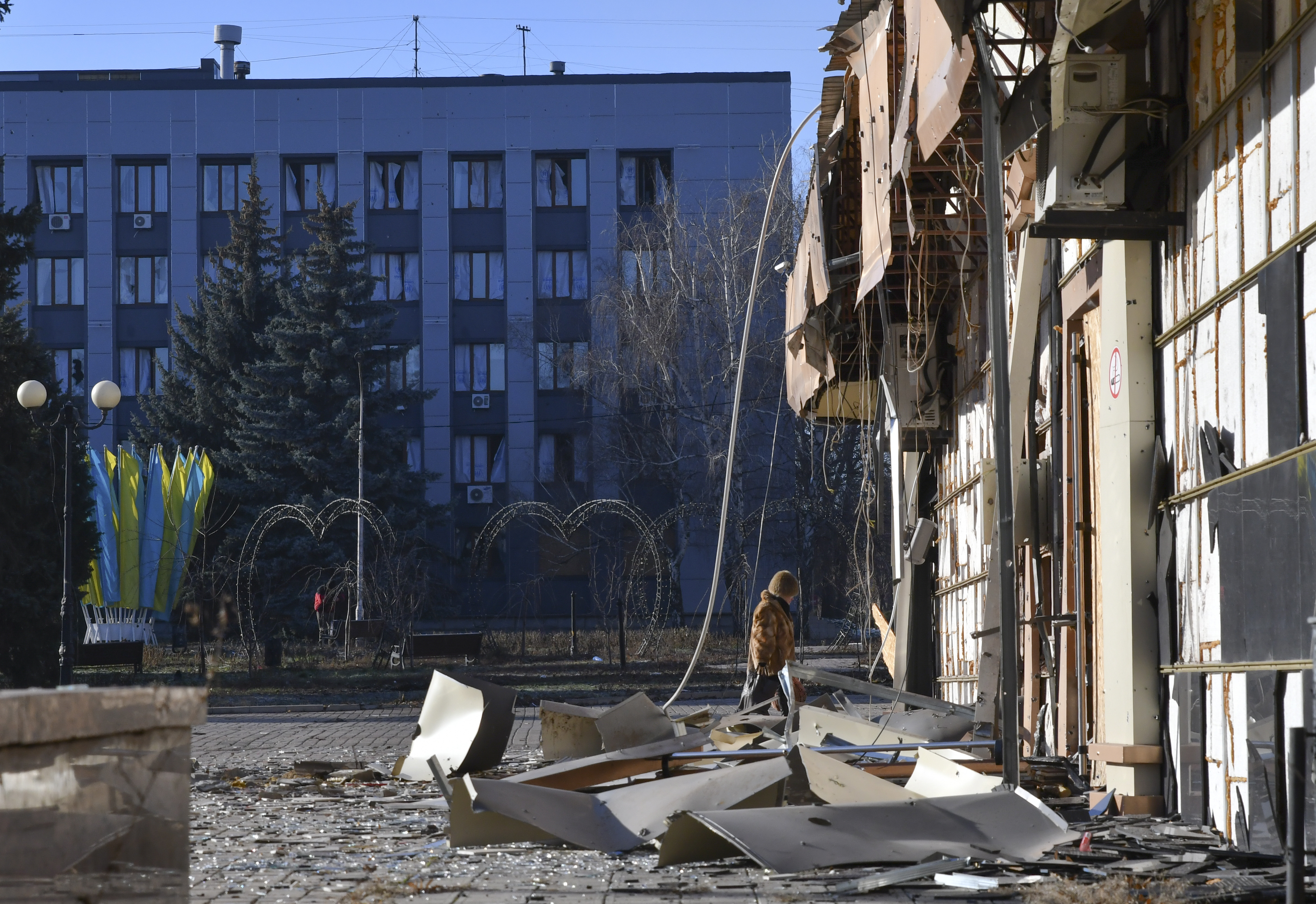 A local resident walks along a street in the area of the heaviest battles with the Russian invaders in Bakhmut, Ukraine, Tuesday.