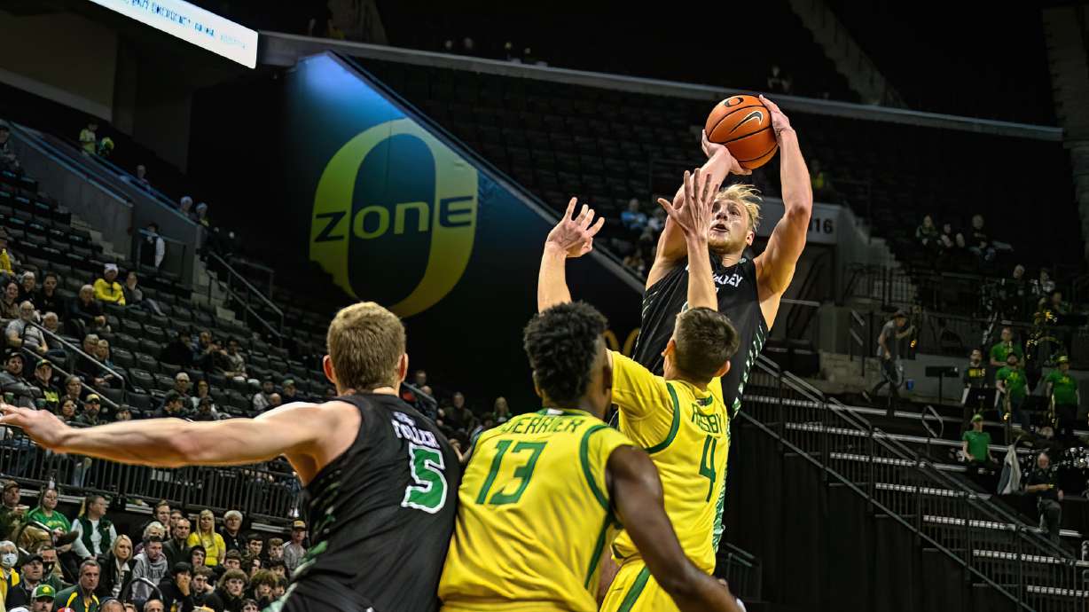 UVU guard Trey Woodbury takes a shot as the Utah Valley Wolverines meet the Oregon Ducks in Men’s NCAA basketball at Matthew Knight Arena, Tuesday, Dec. 20, 2022 in Eugene, Oregon.