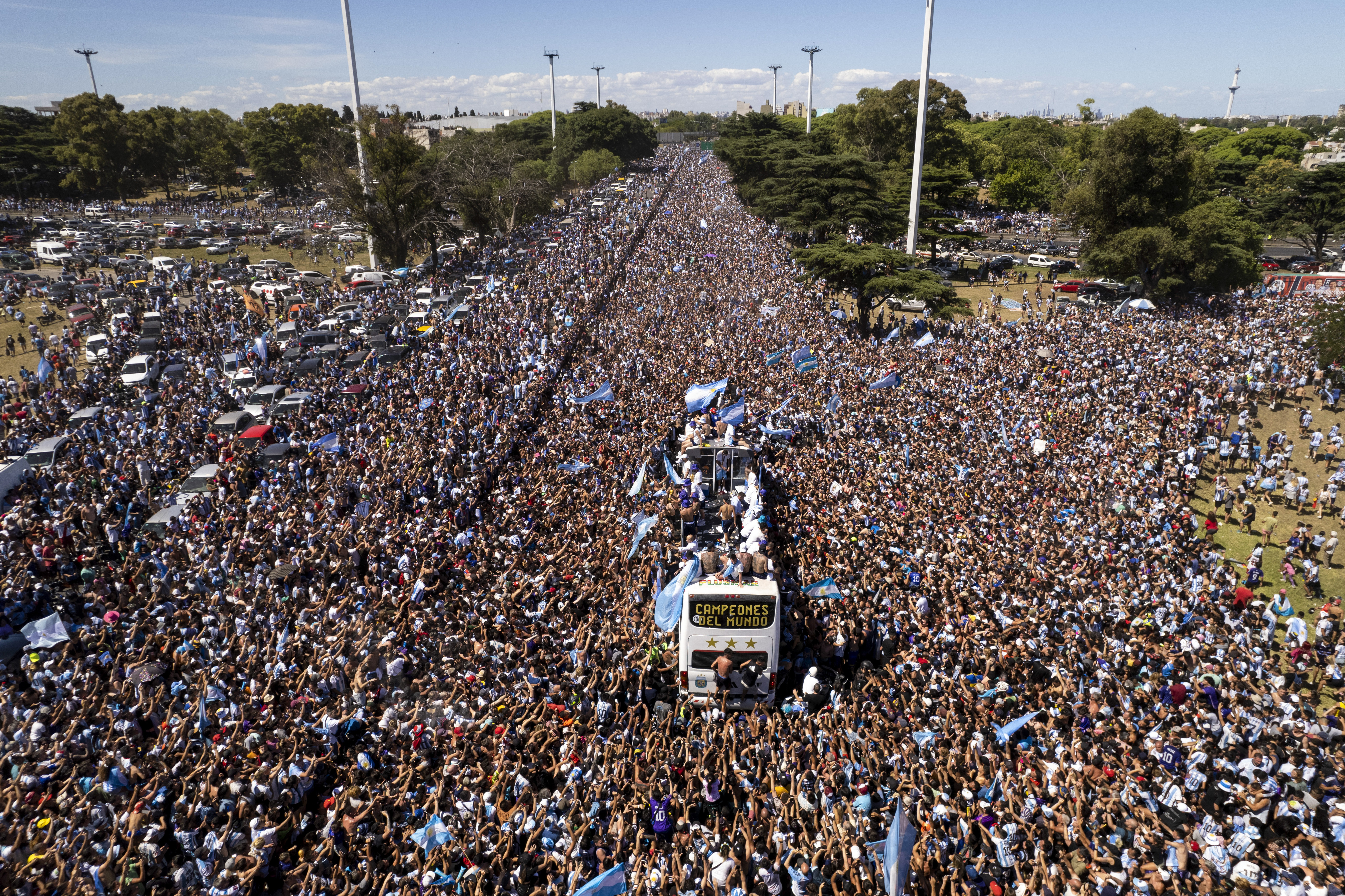 The Argentine soccer team that won the World Cup title ride on an open bus during their homecoming parade in Buenos Aires, Argentina, Tuesday, Dec. 20, 2022. 