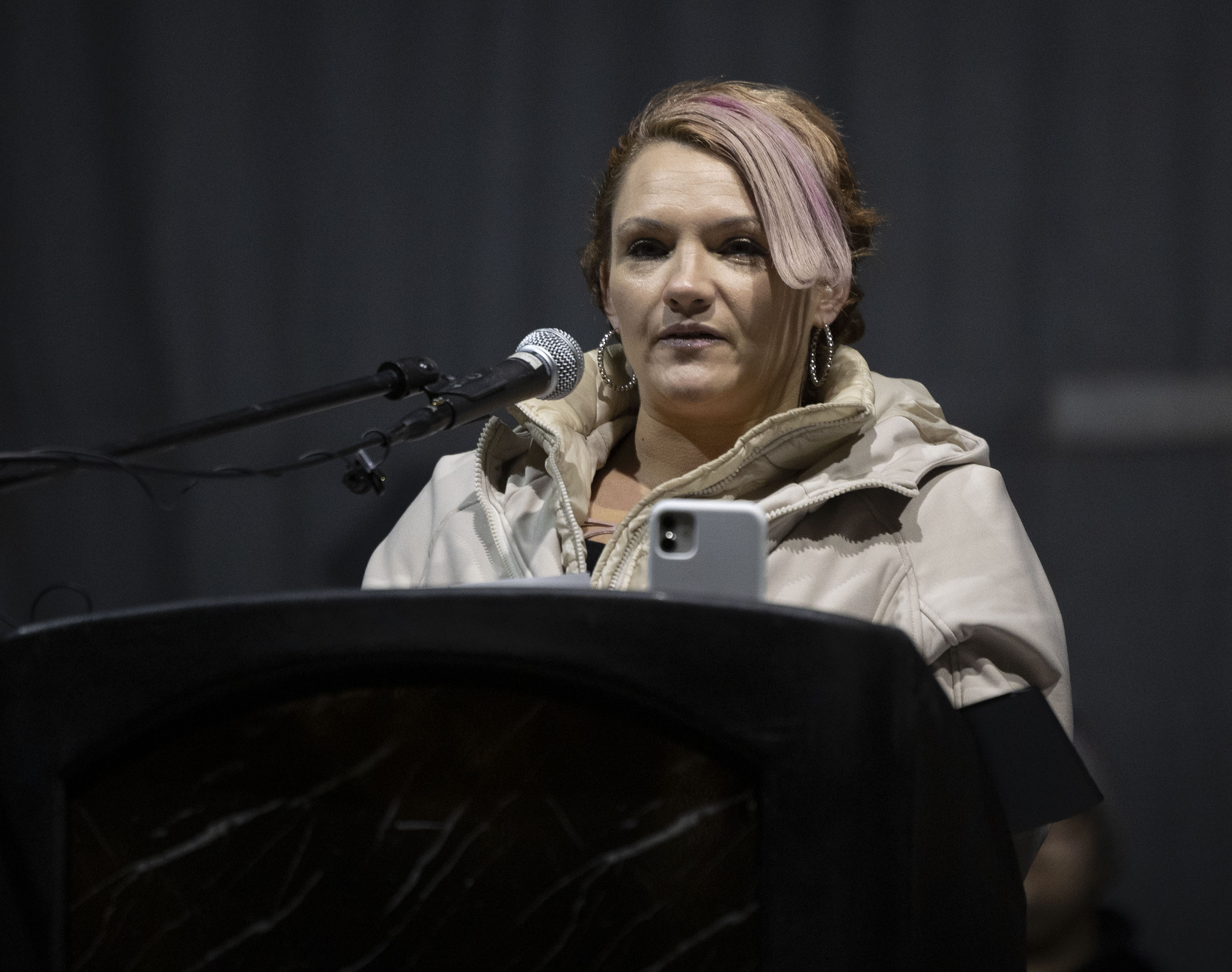 Steffine Amount speaks at the annual candlelight vigil honoring those who died while homeless this year at Pioneer Park in Salt Lake City on Wednesday. At least 159 people who were homeless in Utah died in 2022.