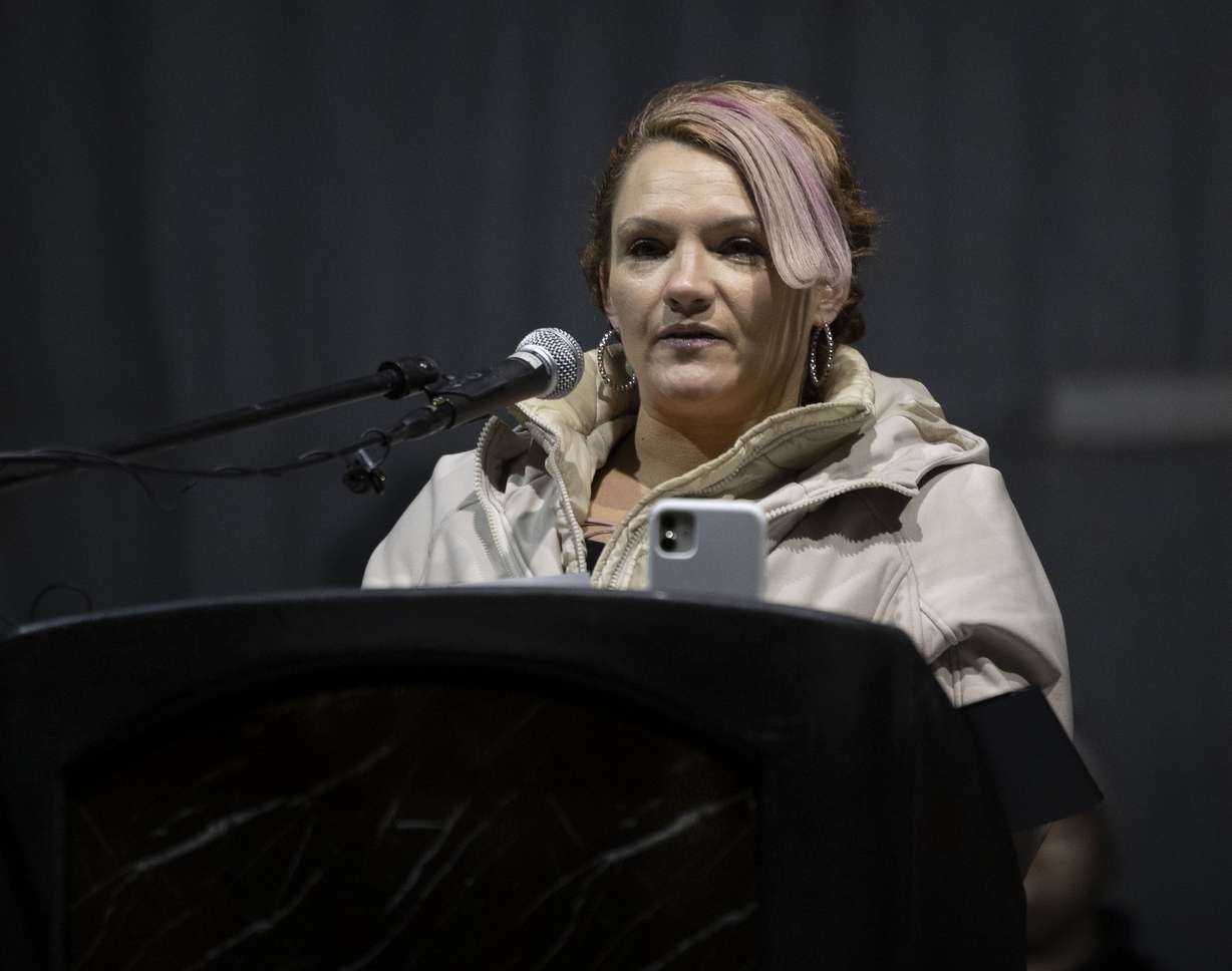 Steffine Amount speaks at the annual candlelight vigil honoring those who died while homeless this year at Pioneer Park in Salt Lake City on Wednesday. At least 159 people who were homeless in Utah died in 2022.