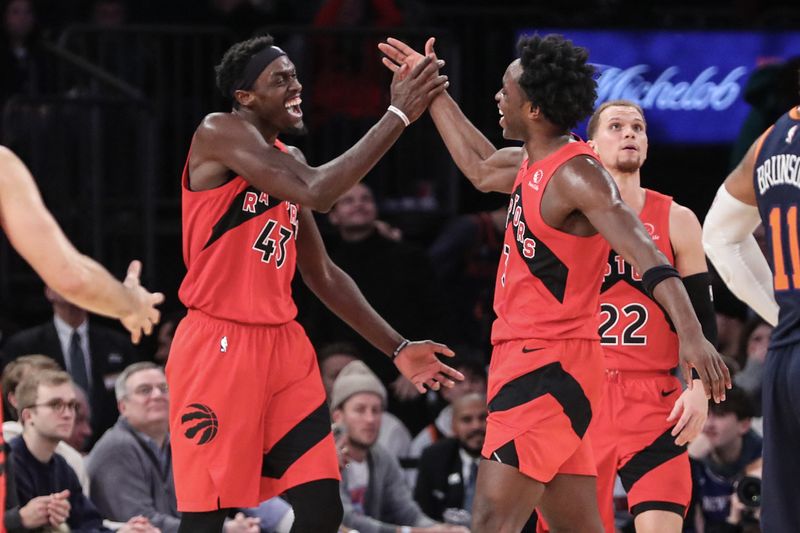Dec 21, 2022; New York, New York, USA;  Toronto Raptors forward Pascal Siakam (43) celebrates after scoring with forward O.G. Anunoby (3) in the fourth quarter against the New York Knicks at Madison Square Garden.