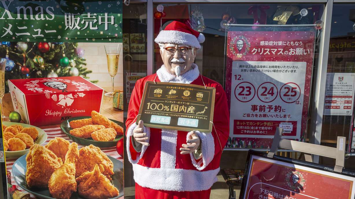 A statue of Colonel Sanders in Santa outfit is pictured on Dec. 23, 2020 in Tokyo, Japan. KFC at Christmas has become something of a tradition in Japan with some attributing its yuletide popularity to a kindergarten delivery being made in a Santa Claus outfit which was such a success it was requested by a number of other schools and subsequently gave the company the idea of associating its product to Christmas.