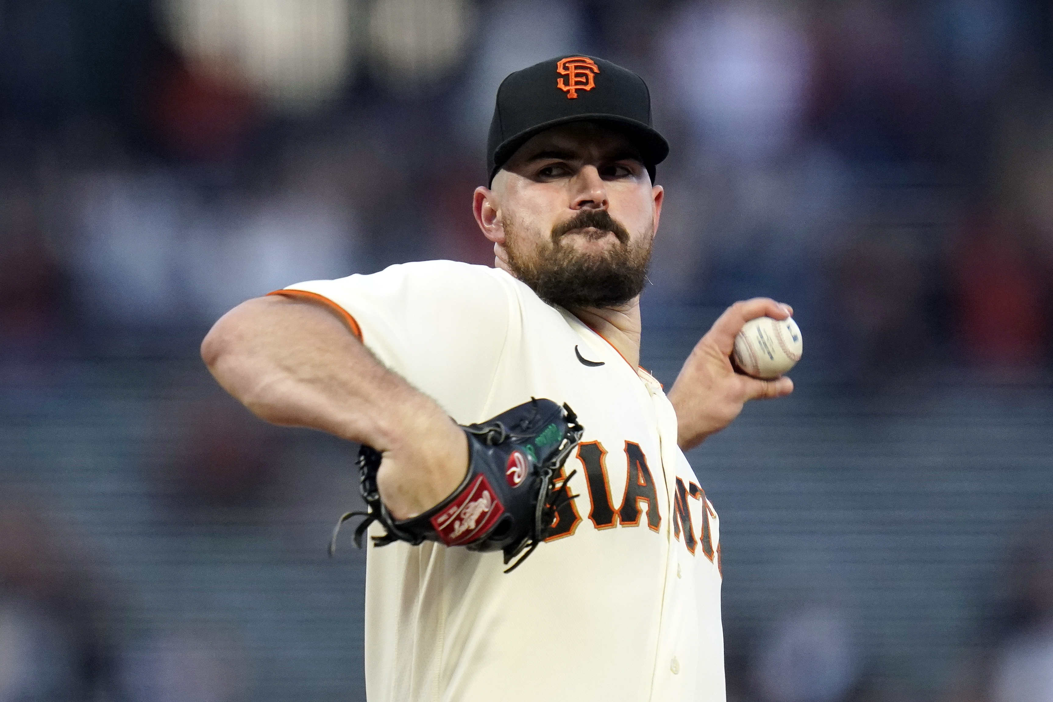 FILE - San Francisco Giants' Carlos Rodón pitches against the Colorado Rockies during the first inning of a baseball game in San Francisco, on Sept. 29, 2022. The New York Yankees added Rodón to their rotation on Thursday, Dec. 15, 2022, agreeing to a $162 million, six-year contract with the left-hander. 