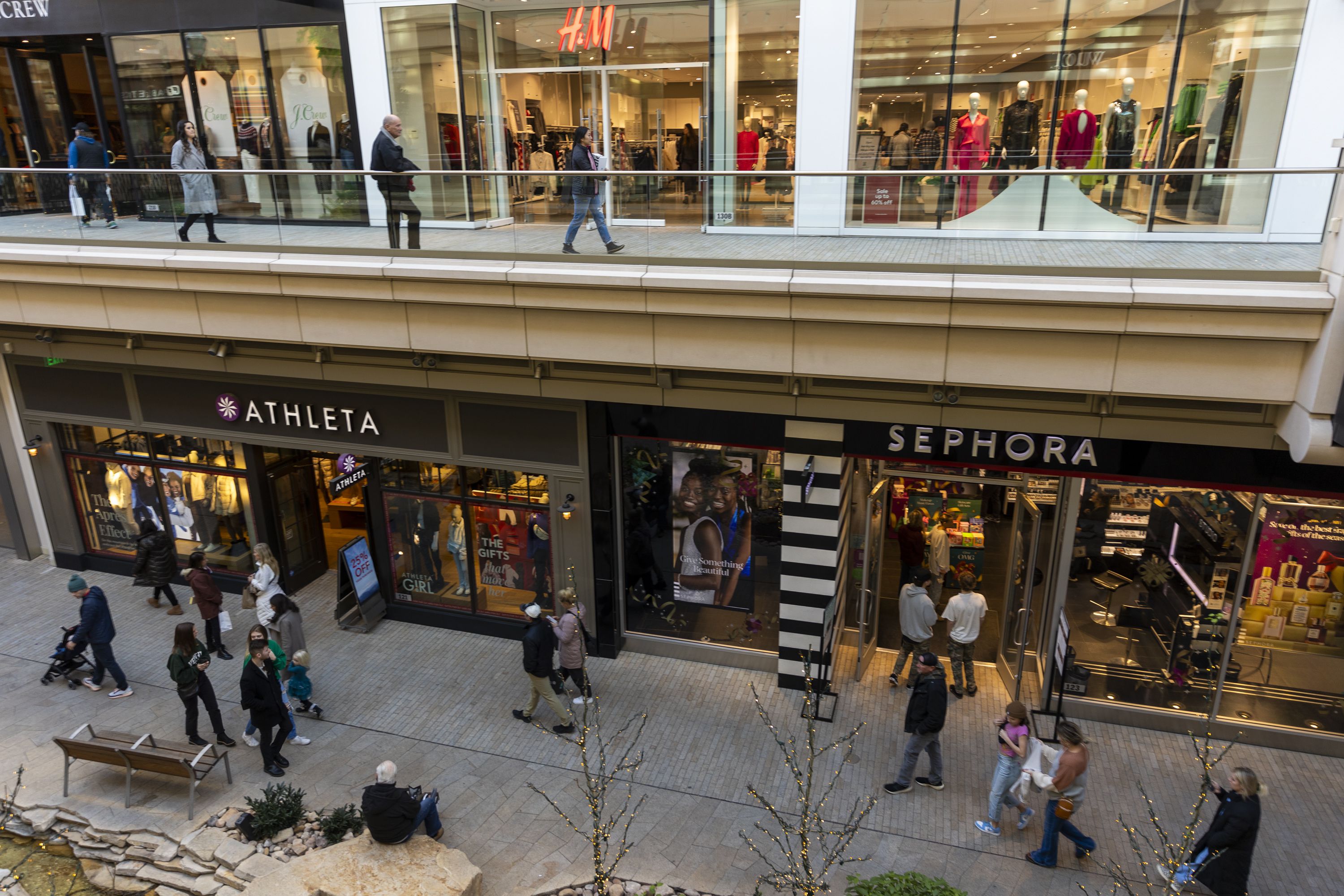 Shoppers walk around City Creek Center in Salt Lake City on Dec. 17. Retailers are celebrating a 2022 calendar that favors robust holiday shopping season.