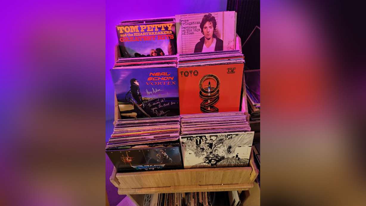 A collection of vinyl albums sits at the recording studio of Adam Reader, aka Professor of Rock.