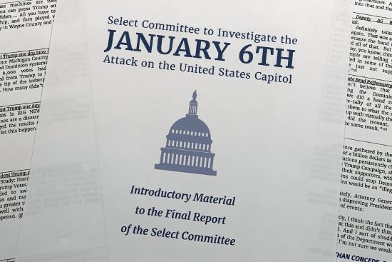 Pages of the executive summary from the House select committee investigating the Jan. 6 attack on the U.S. Capitol, are photographed Monday in Washington.