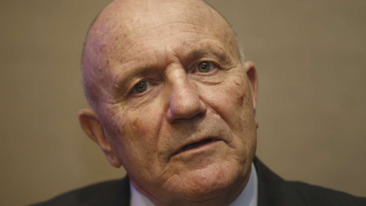 FILE - George Cohen, one of four members of the England 1966 World Cup winning side, talks to the media at the Royal garden Hotel in London Tuesday, Jan. 5, 2016. George Cohen, the right-back for England World Cup-winning team of 1966, has died aged 83, his former club Fulham have announced on Friday, Dec. 23, 2022.