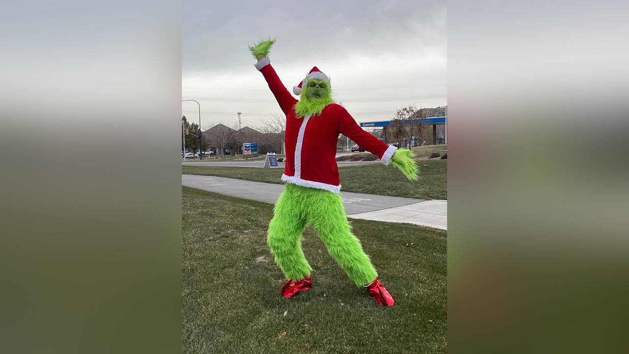 Michael Johnson, of Eagle Mountain, dresses as the Grinch every year to spread holiday cheer throughout his community.