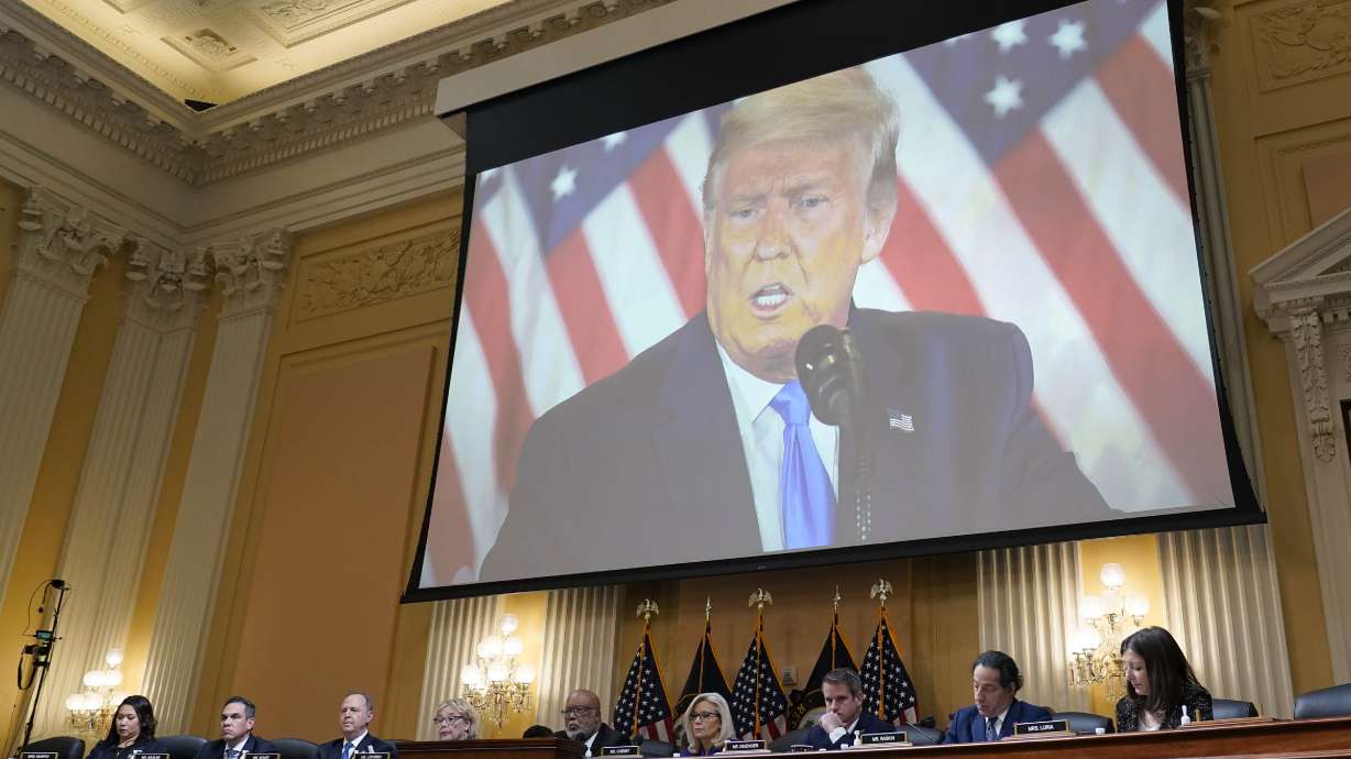 A video of former President Donald Trump is shown on a screen, as the House select committee investigating the Jan. 6 attack on the U.S. Capitol holds its final meeting on Capitol Hill in Washington, Dec. 19.