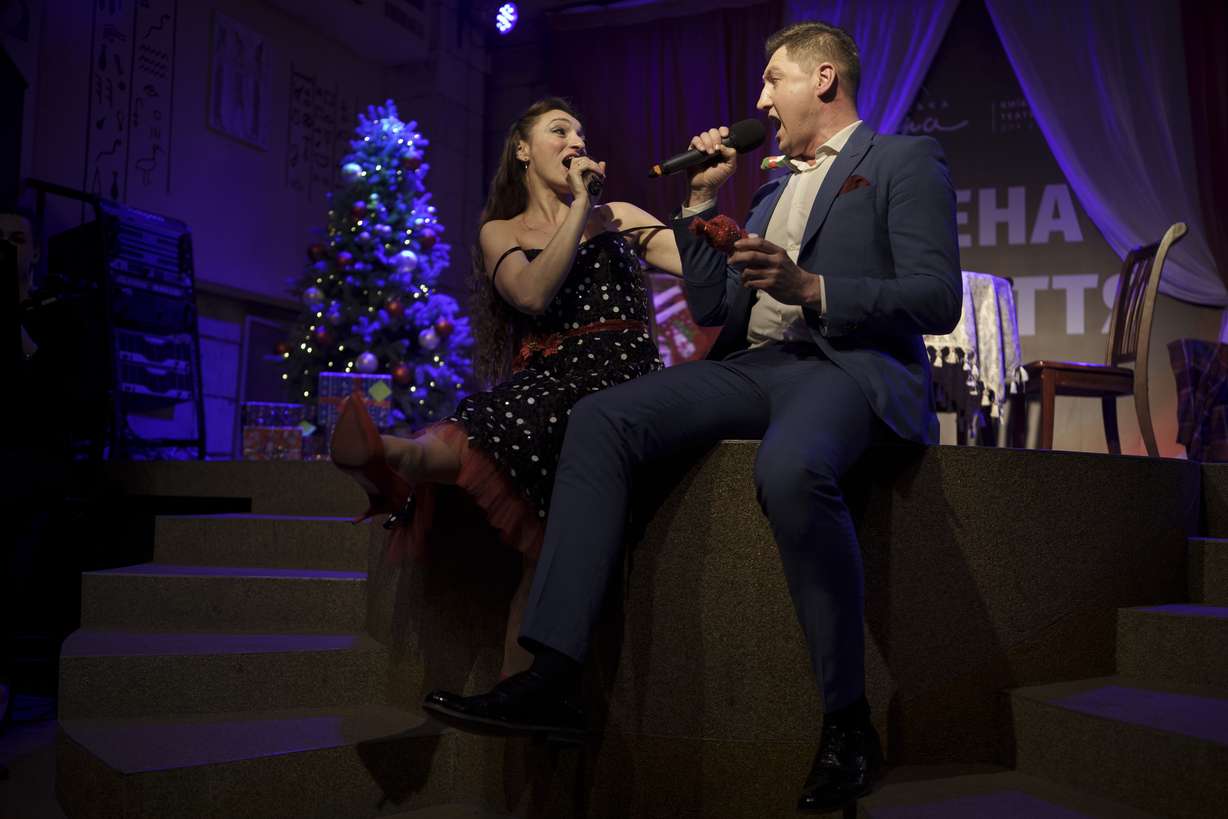Members of the Kyiv Opera Theater perform the "Christmas in Shelter" concert, on a stage underground in Kyiv, Ukraine, Saturday, Dec. 24, 2022.
