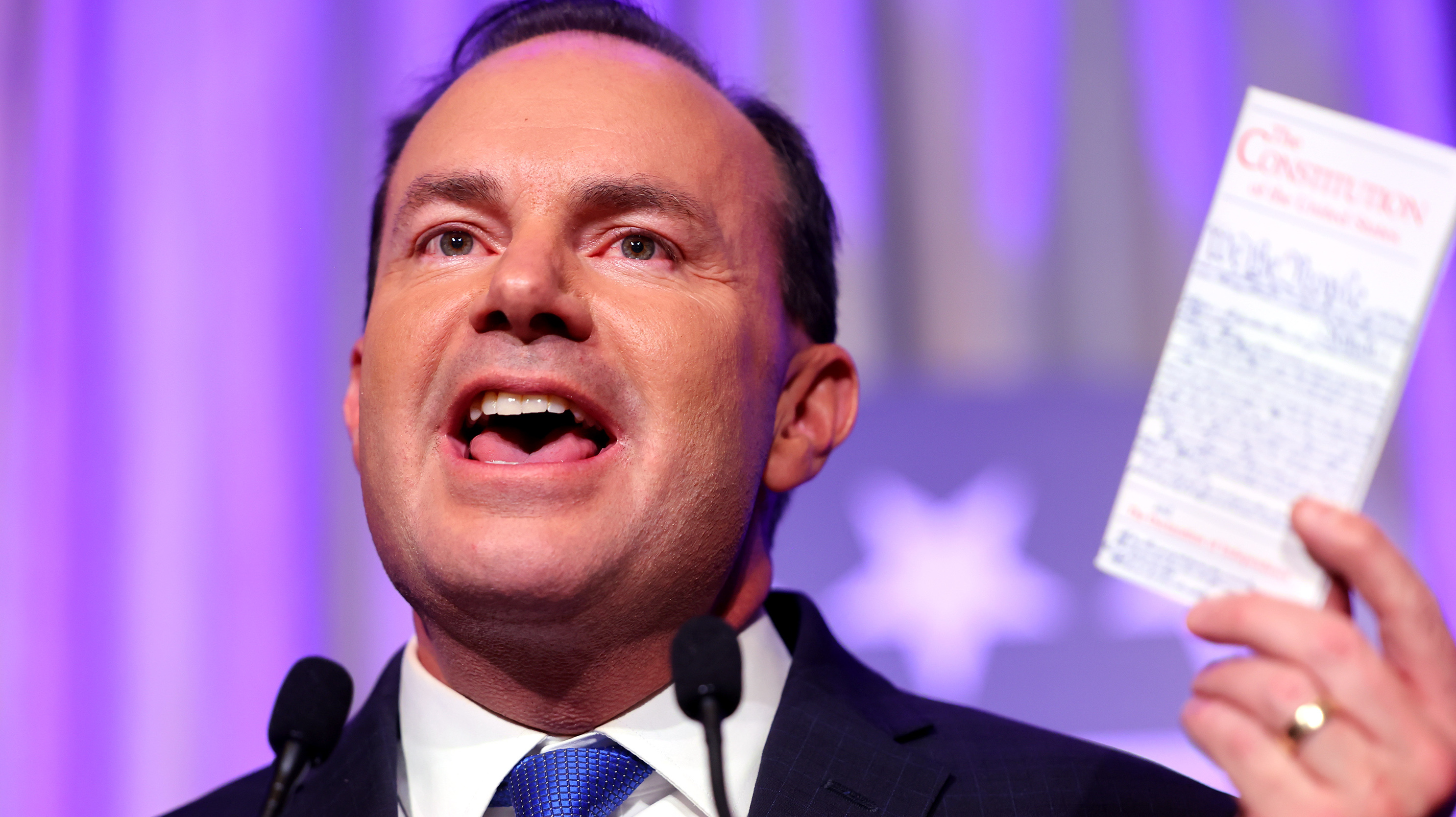 Sen. Mike Lee, R-Utah, holds his pocket copy of the Constitution at an election party at the Hyatt Regency in Salt Lake on Nov. 8. Lee comes up several times in the Jan. 6 committee's final report.