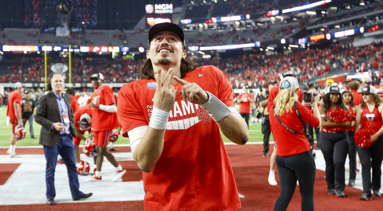 Utah Utes QB Cameron Rising celebrates beating the USC Trojans in the Pac-12 championship at the Allegiant Stadium in Las Vegas on Friday, Dec. 2, 2022. The Utes won 47-24.