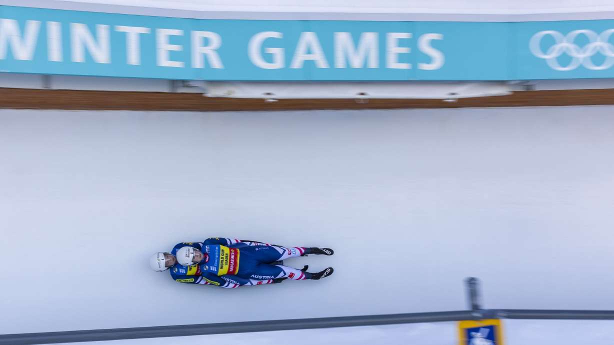 Austria’s Selina Egle and Lara Michaela Kipp race in the women’s luge doubles competition for the World Cup in Park City on Dec. 16.