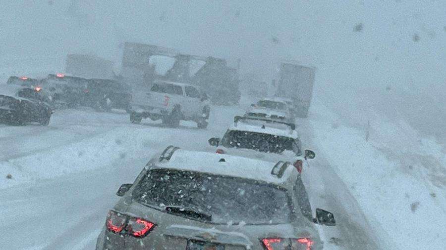 Vehicles struggle in snowy conditions on I-15 in central Utah Wednesday.