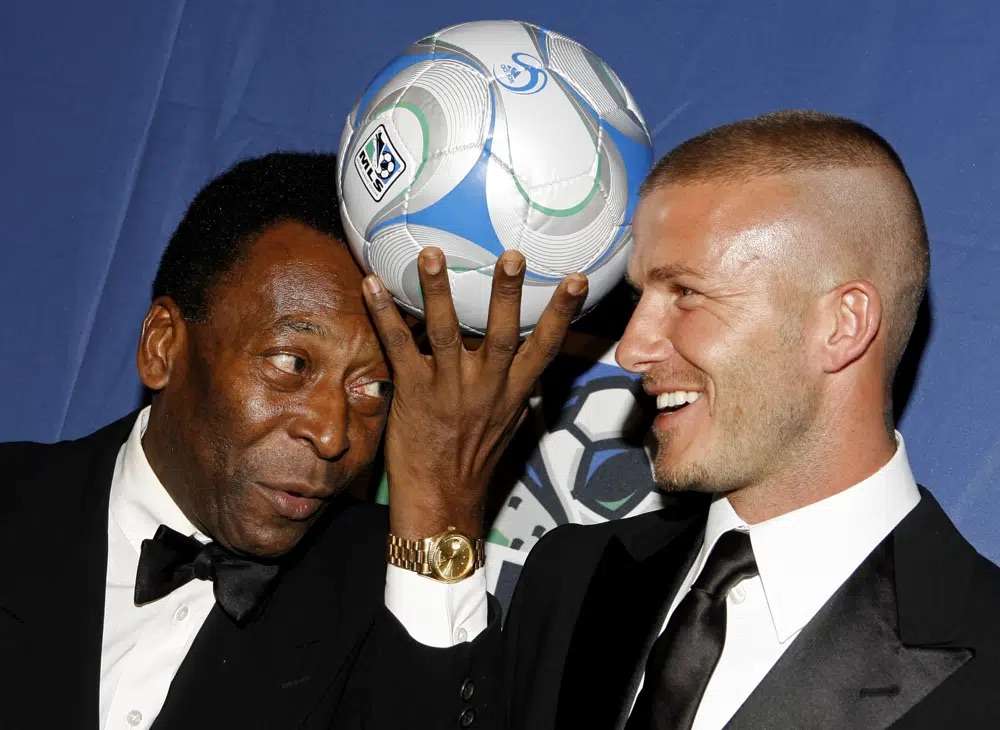 Brazilian soccer great Pele, and English soccer star David Beckham pose for photos during a U.S. Soccer Foundation fundraising gala, in New York, March 19, 2008. Pelé, the Brazilian king of soccer died in Sao Paulo on Thursday. He was 82.