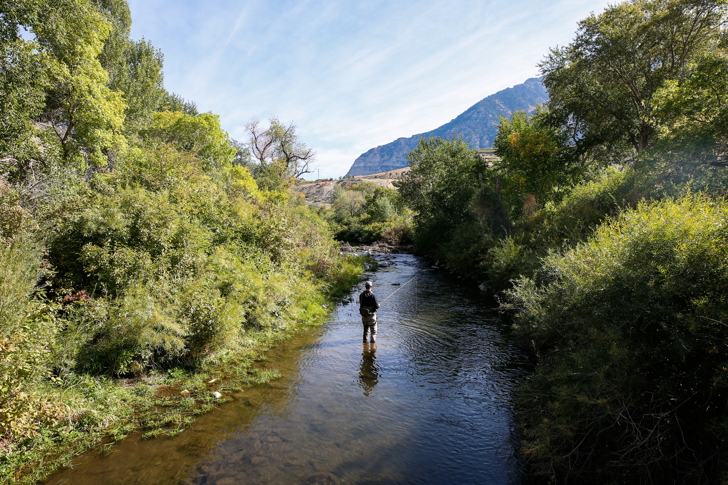 A fisherman fishes at the Provo River in Provo Canyon on Sept. 27, 2020. Anglers in Utah set 11 new records in 2022.