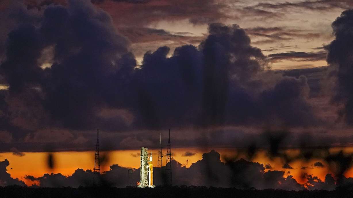 The NASA moon rocket stands ready at sunrise on Pad 39B before the Artemis 1 mission to orbit the moon at the Kennedy Space Center on Monday, Aug. 29 in Cape Canaveral, Fla.