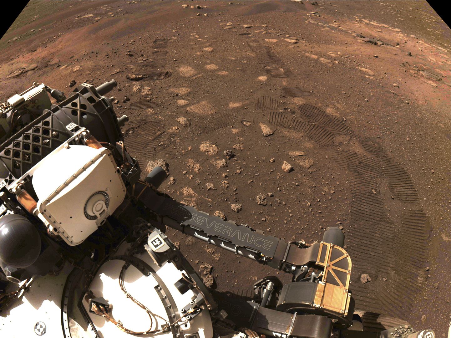 This photo made available by NASA was taken during the first drive of the Perseverance rover on Mars on March 4, 2021. A NASA rover on Mars by chance had its microphone on when a whirling tower of red dust passed overhead and caught the sound. Scientists released the first-of-its-kind audio on Dec. 13.