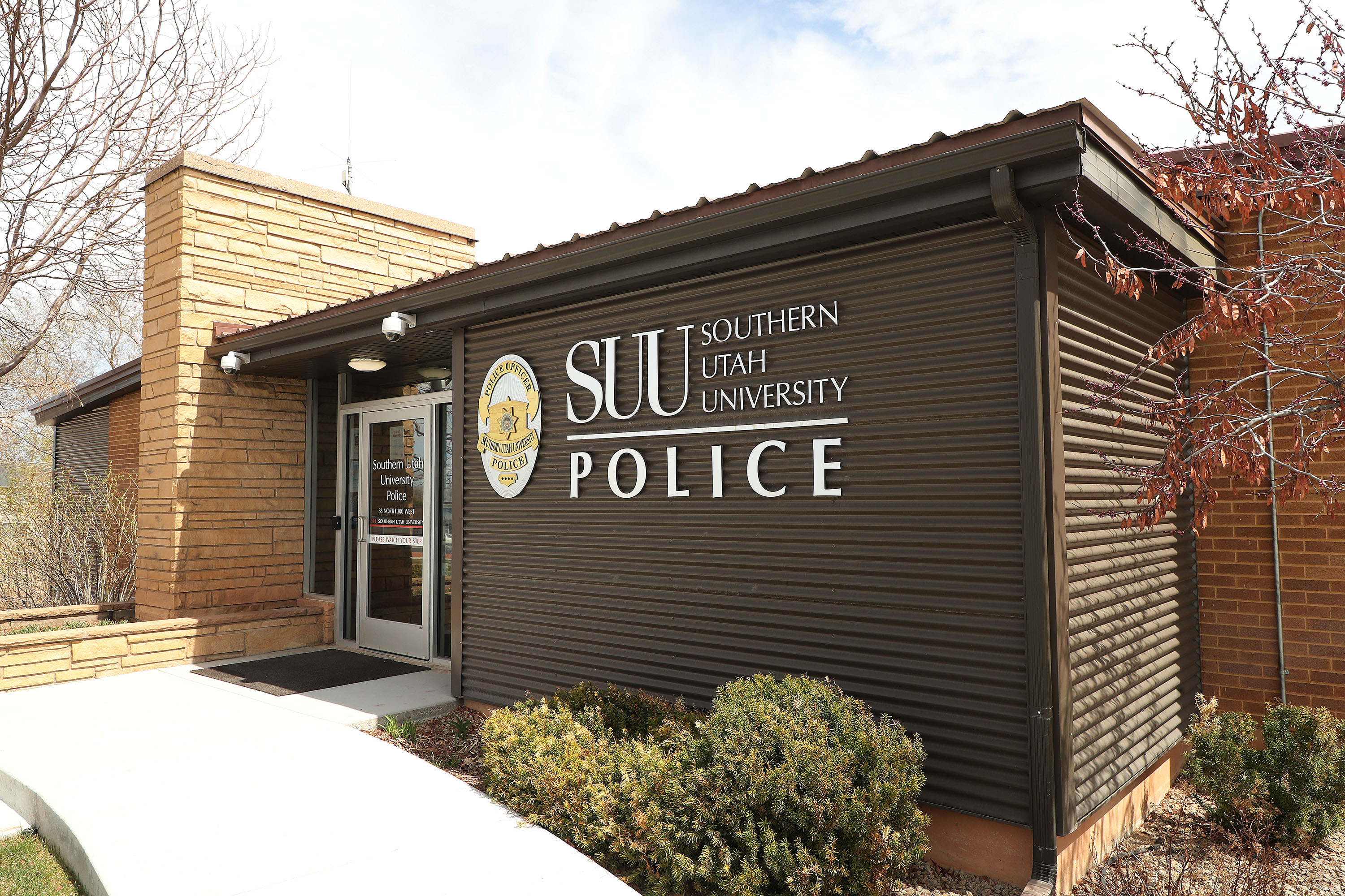 An arrest warrant has been issued for a lecturer at Southern Utah University charged with making violent threats against a department head and students.
