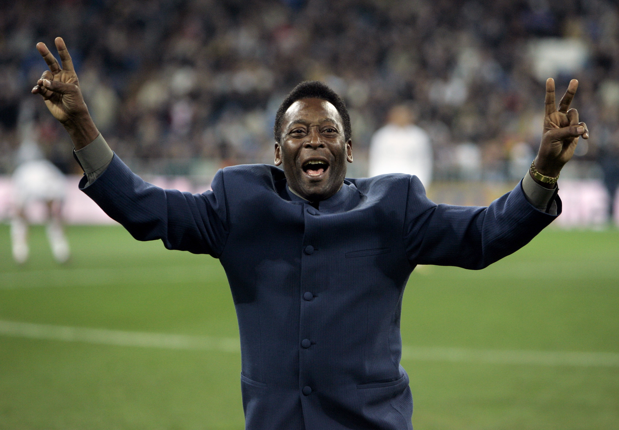 FILE - Brazil's soccer legend Pele greets the crowd ahead of a Spanish league soccer match, in the Santiago Bernabeu stadium in Madrid, Jan. 16, 2005. Pelé, the Brazilian king of soccer who won a record three World Cups and became one of the most commanding sports figures of the last century, died in Sao Paulo on Thursday, Dec. 29, 2022. He was 82. 