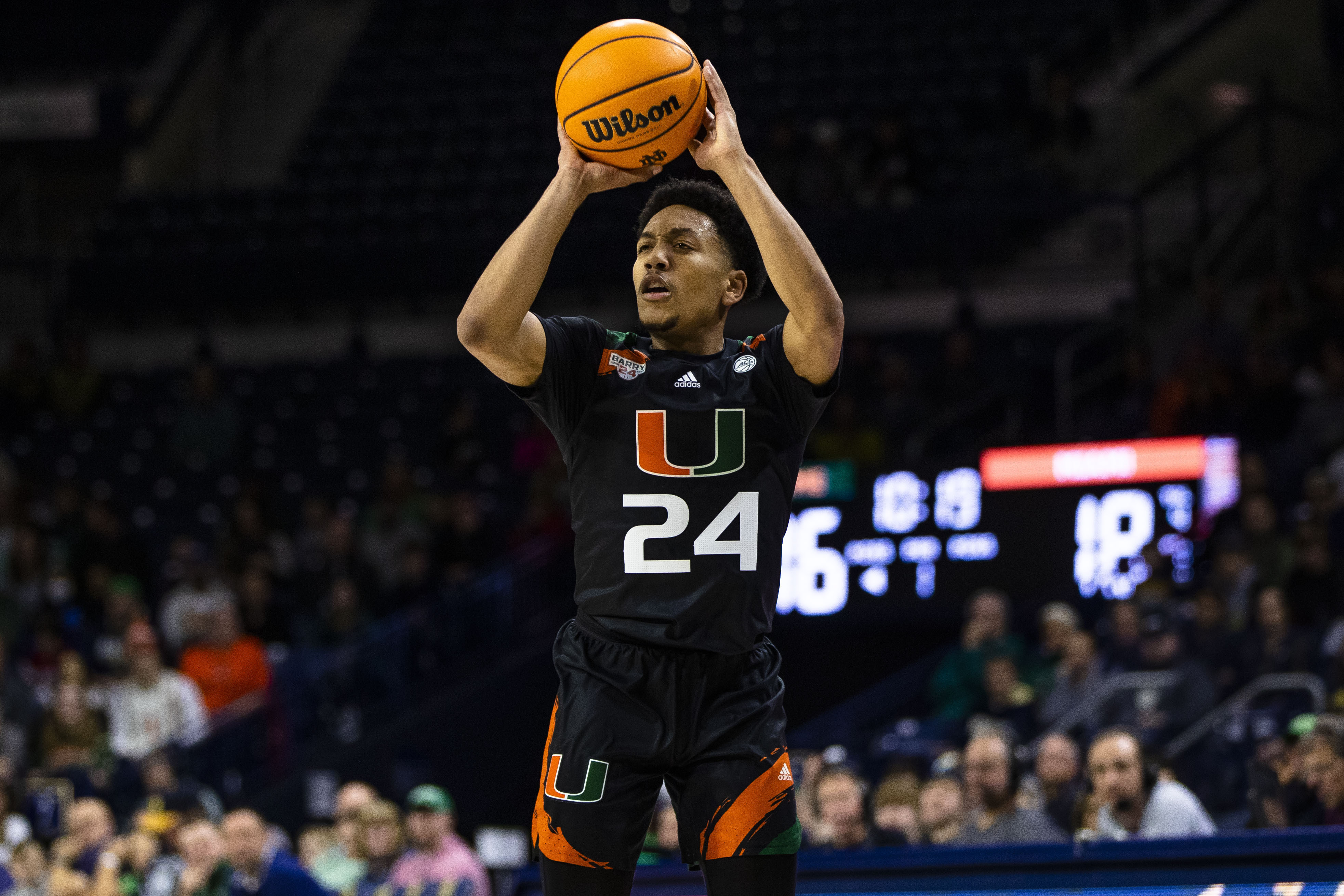 Miami's Nijel Pack (24) shoots during the first half of an NCAA college basketball game against Notre Dame, Friday, Dec. 30, 2022 in South Bend, Ind. 