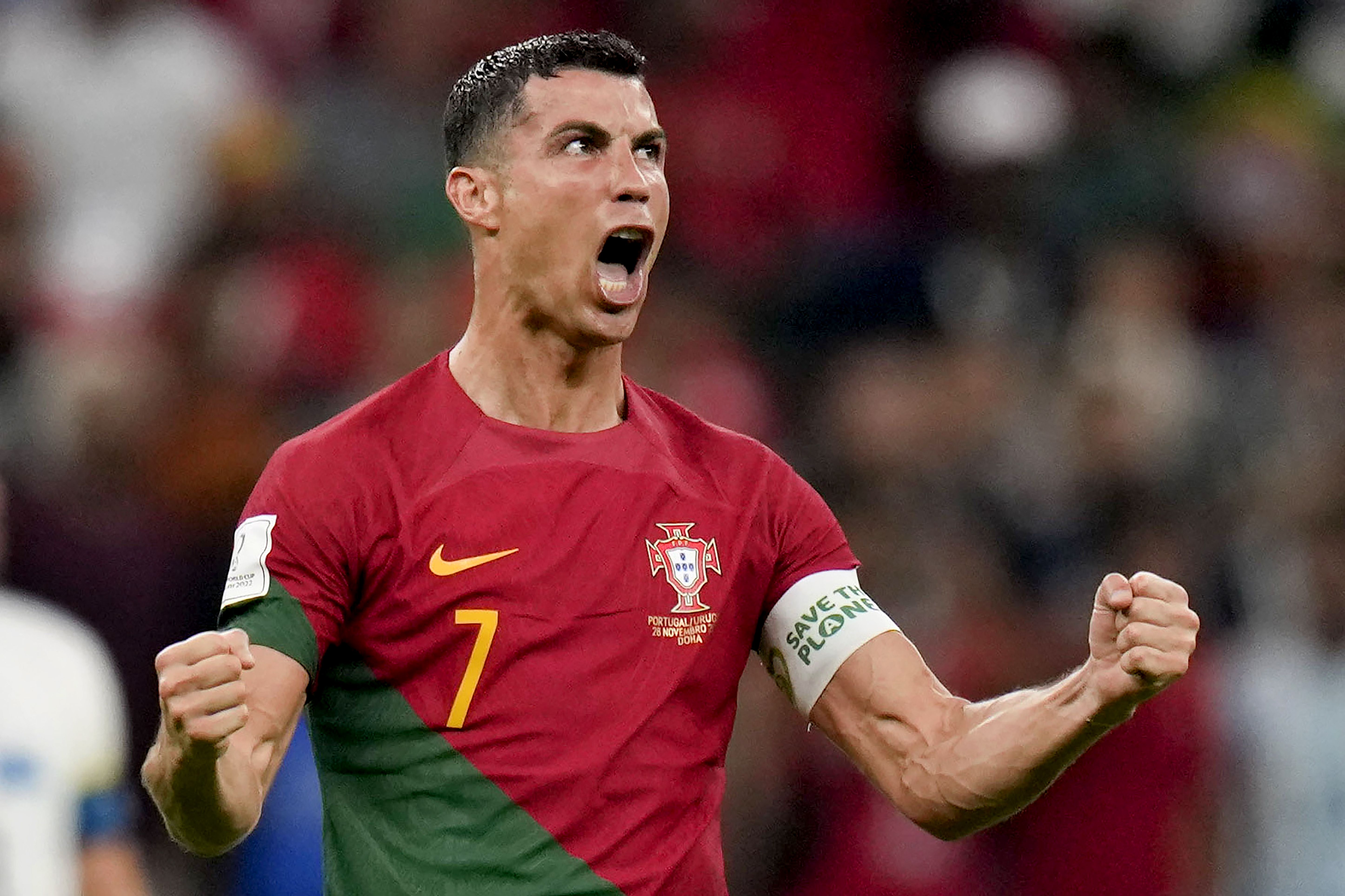 FILE - Portugal's Cristiano Ronaldo celebrates his side's opening goal during the World Cup group H soccer match between Portugal and Uruguay, at the Lusail Stadium in Lusail, Qatar, Monday, Nov. 28, 2022.