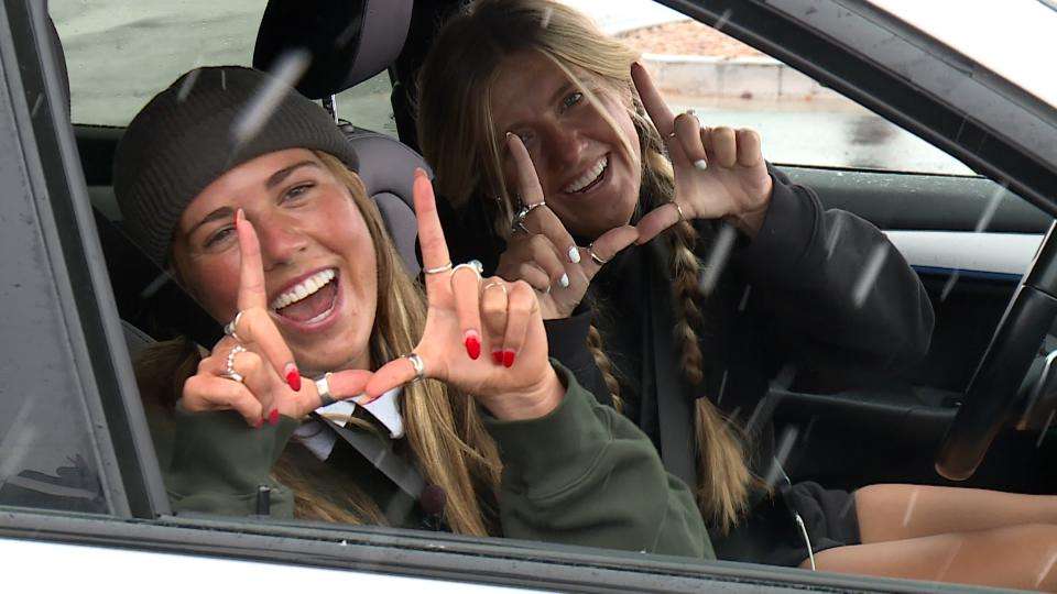 The Leishmans show their Utah Utes pride from their car on Dec. 30, as they road trip to Pasadena for the Rose Bowl football game.