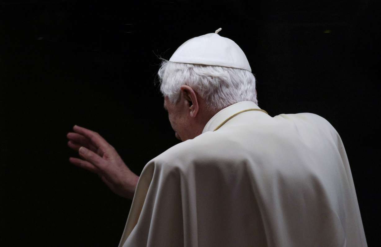 Pope Benedict XVI waves from his popemobile as he leaves a youth gathering in St. Peter's square at the Vatican on March 25, 2010. Pope Emeritus Benedict XVI, the German theologian who will be remembered as the first pope in 600 years to resign, has died, the Vatican announced Saturday. He was 95.
