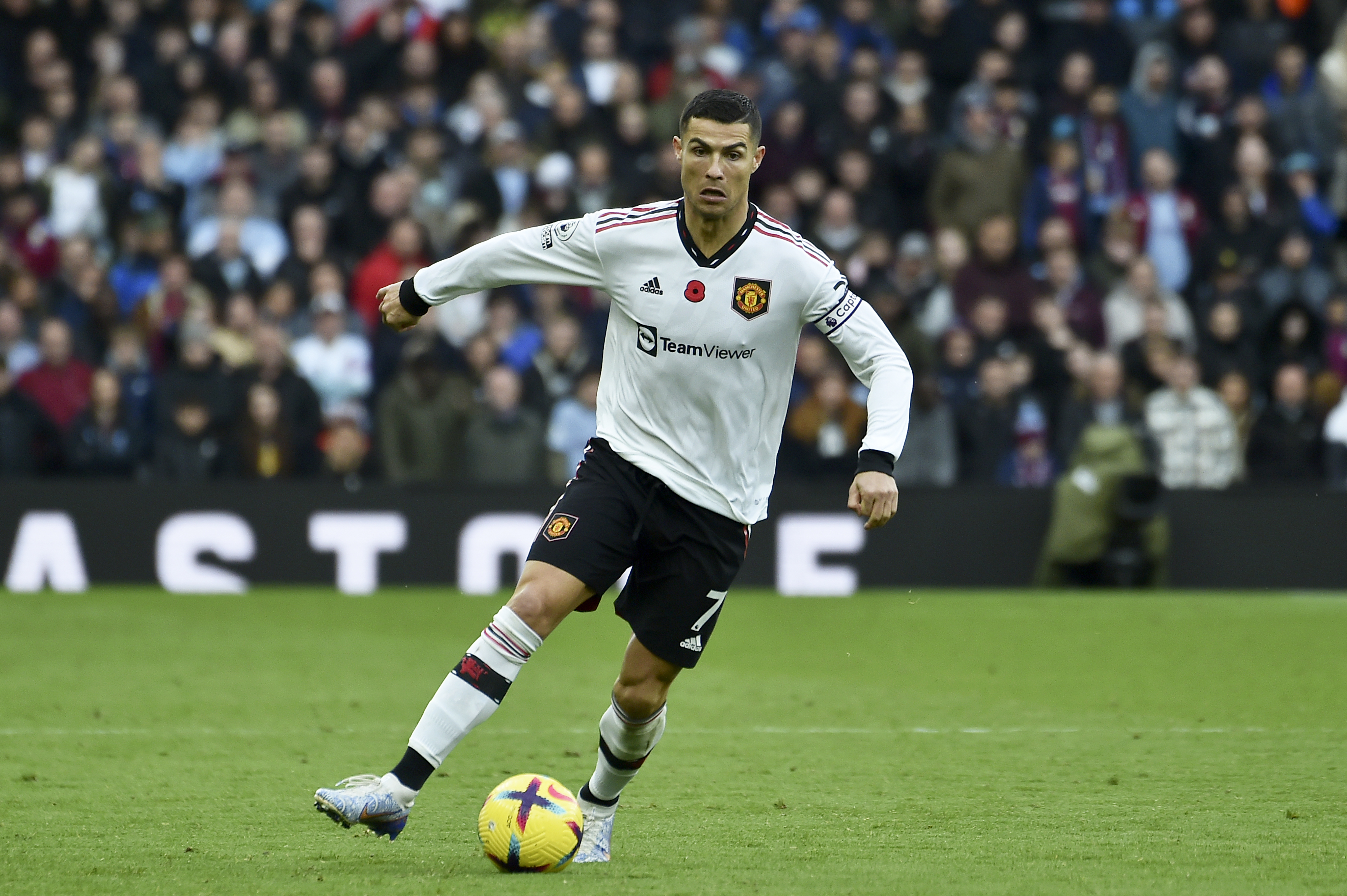 FILE - Manchester United's Cristiano Ronaldo runs with the ball during the English Premier League soccer match between Aston Villa and Manchester United at Villa Park in Birmingham, England, on Nov. 6, 2022. Less than two weeks after his great rival Lionel Messi lifted the World Cup, Cristiano Ronaldo has completed a move to Saudi Arabian club Al Nassr and likely signalled the end of his career in elite club soccer. In agreeing a contract until 2025, the five-time Ballon d’Or winner has ended speculation about his future after having his contract terminated by Manchester United last month. 