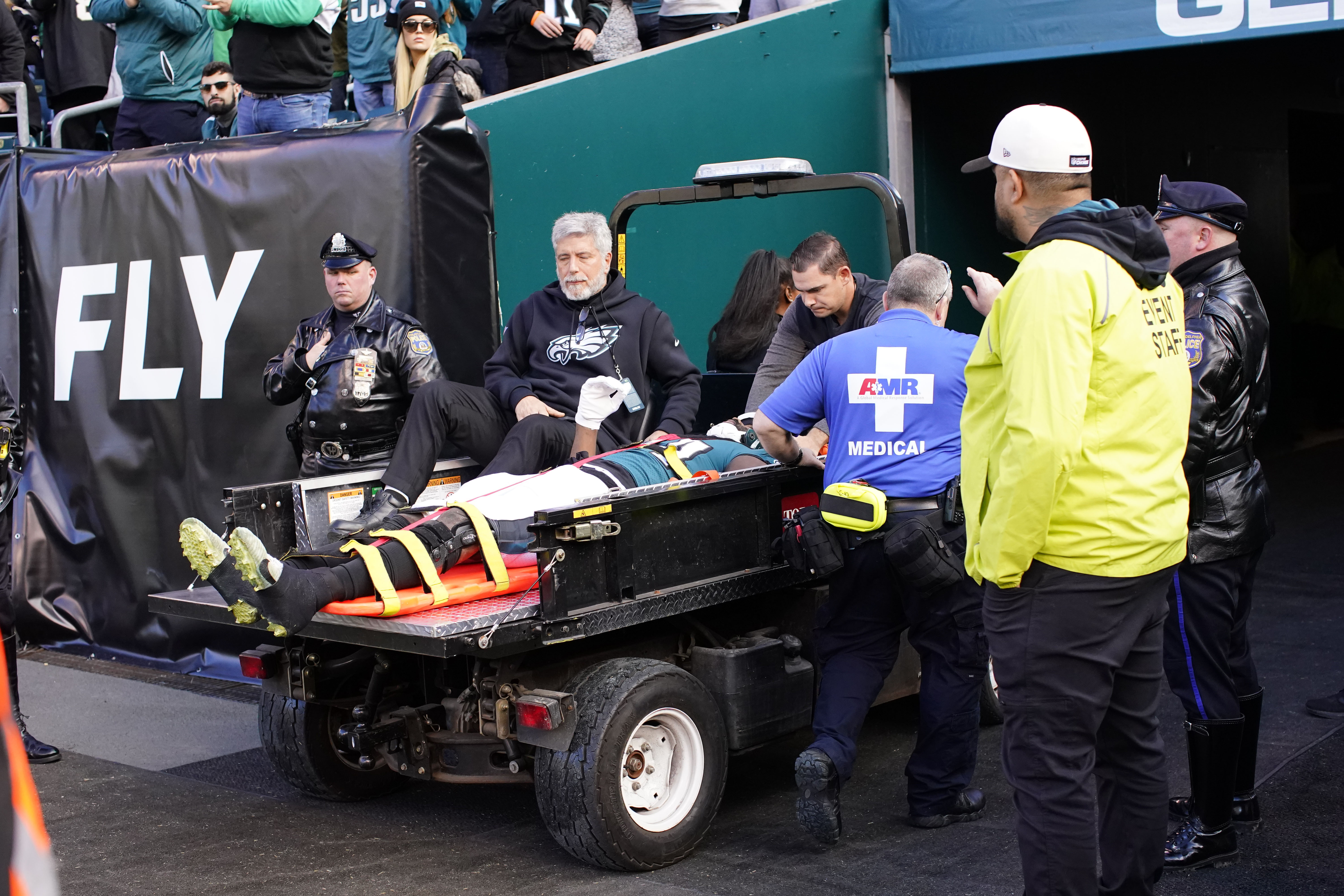 Philadelphia Eagles defensive end Josh Sweat is carted off the field after being injured in the first half of an NFL football game against the New Orleans Saints in Philadelphia, Sunday, Jan. 1, 2023.