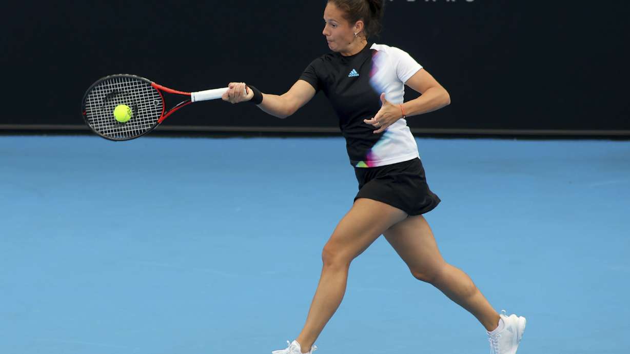 Russia's Daria Kasatkina makes a forehand return to Czech Linda Noskova during their Round of 32 match at the Adelaide International Tennis tournament in Adelaide, Australia, Monday, Jan. 2, 2023.