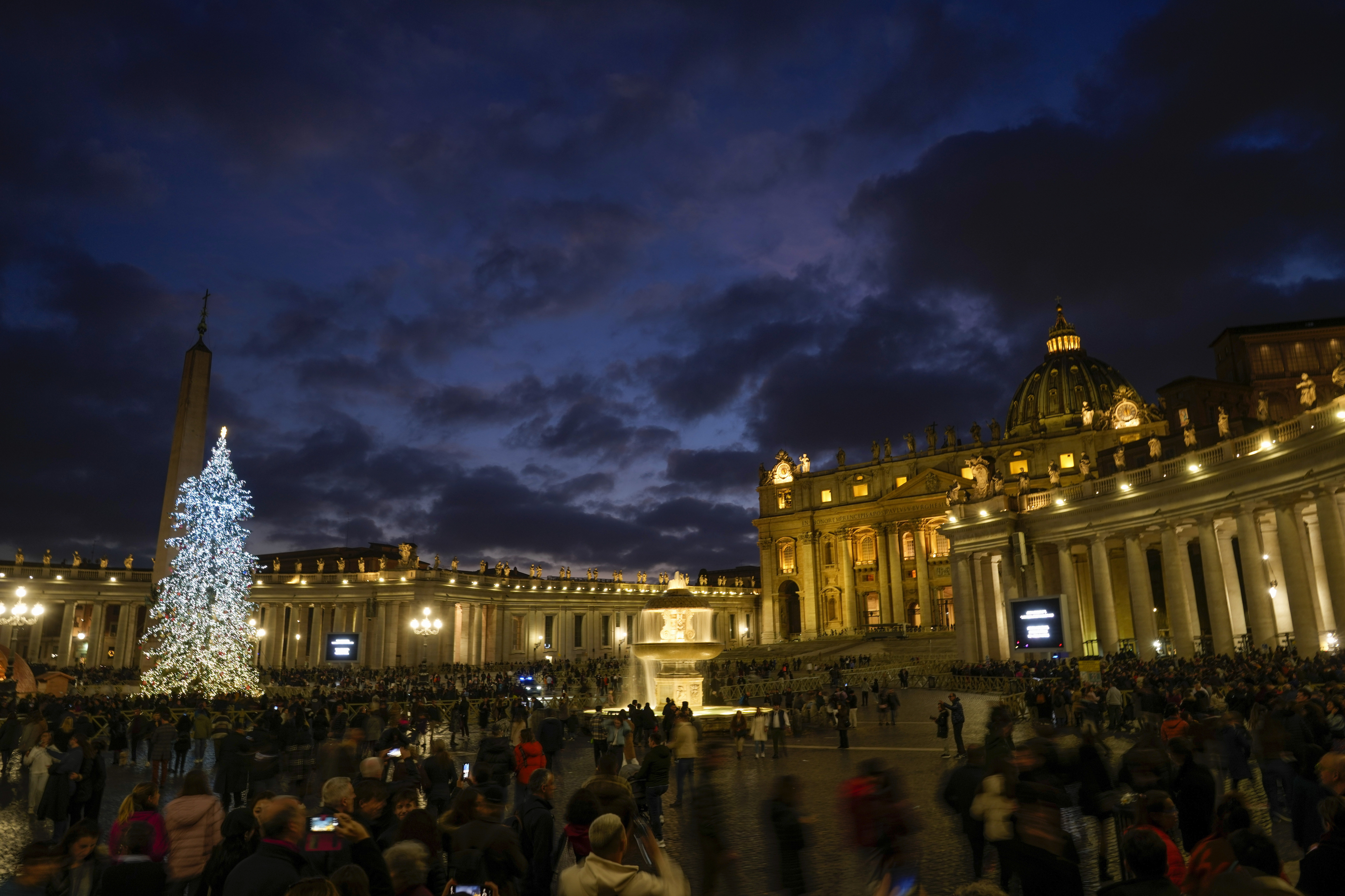Visitors crowd St. Peter's Basilica at the Vatican, Sunday.