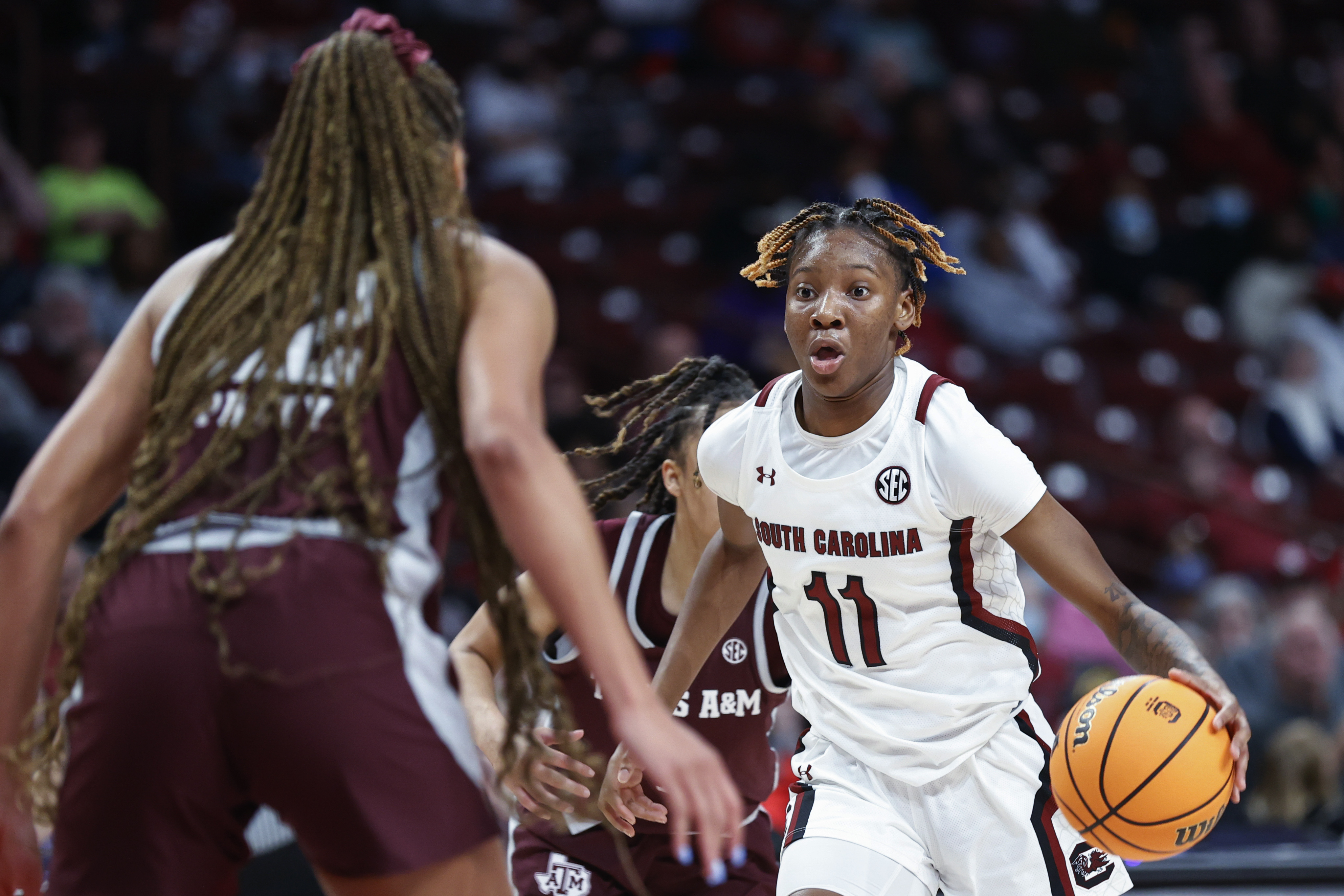 South Carolina guard Talaysia Cooper (11) drives against Texas A&M forward Aaliyah Patty during the second half of an NCAA college basketball game in Columbia, S.C., Thursday, Dec. 29, 2022. South Carolina won 76-34. 