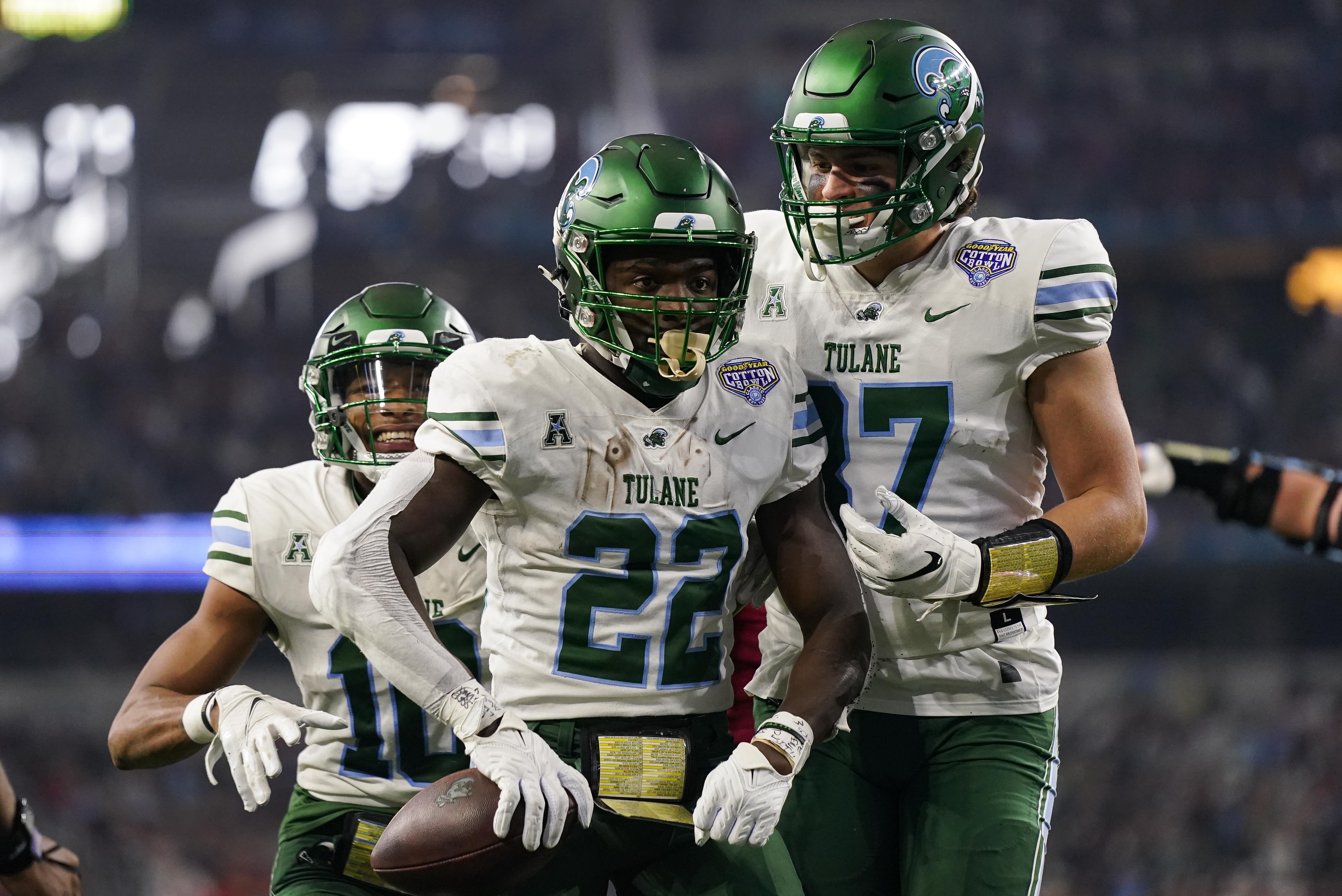 Tulane running back Tyjae Spears (22) celebrates after scoring a touchdown during the first half of the Cotton Bowl NCAA college football game against Southern California, Monday, Jan. 2, 2023, in Arlington, Texas. 