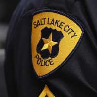Officer who returned fire at fleeing vehicle cleared by Salt Lake district attorney