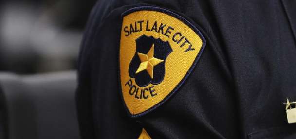 Officer who returned fire at fleeing vehicle cleared by Salt Lake district attorney