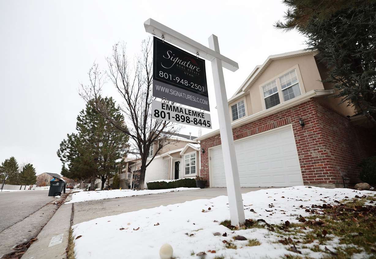 A home is listed for sale in West Jordan on Dec. 21, 2022.