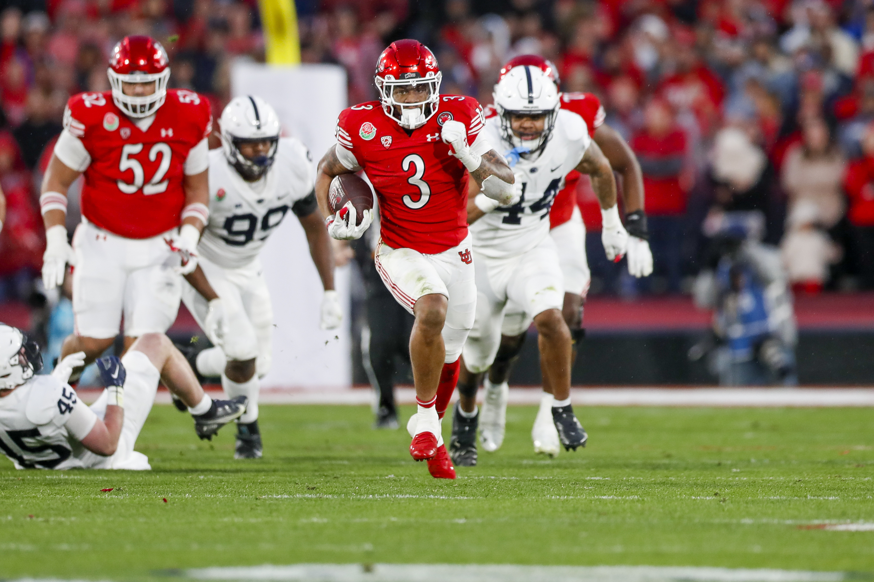The Utah Utes' Ja'Quinden Jackson (3) runs the ball for a first down while playing the Penn State Nittany Lions in the 109th Rose Bowl in Pasadena on Monday, Jan. 2, 2023. The Penn State Nittany Lions won 35-21.