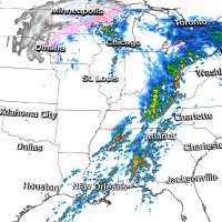 Storm barrels across Central US with tornadoes, flooding, snow; another threatens West Coast
