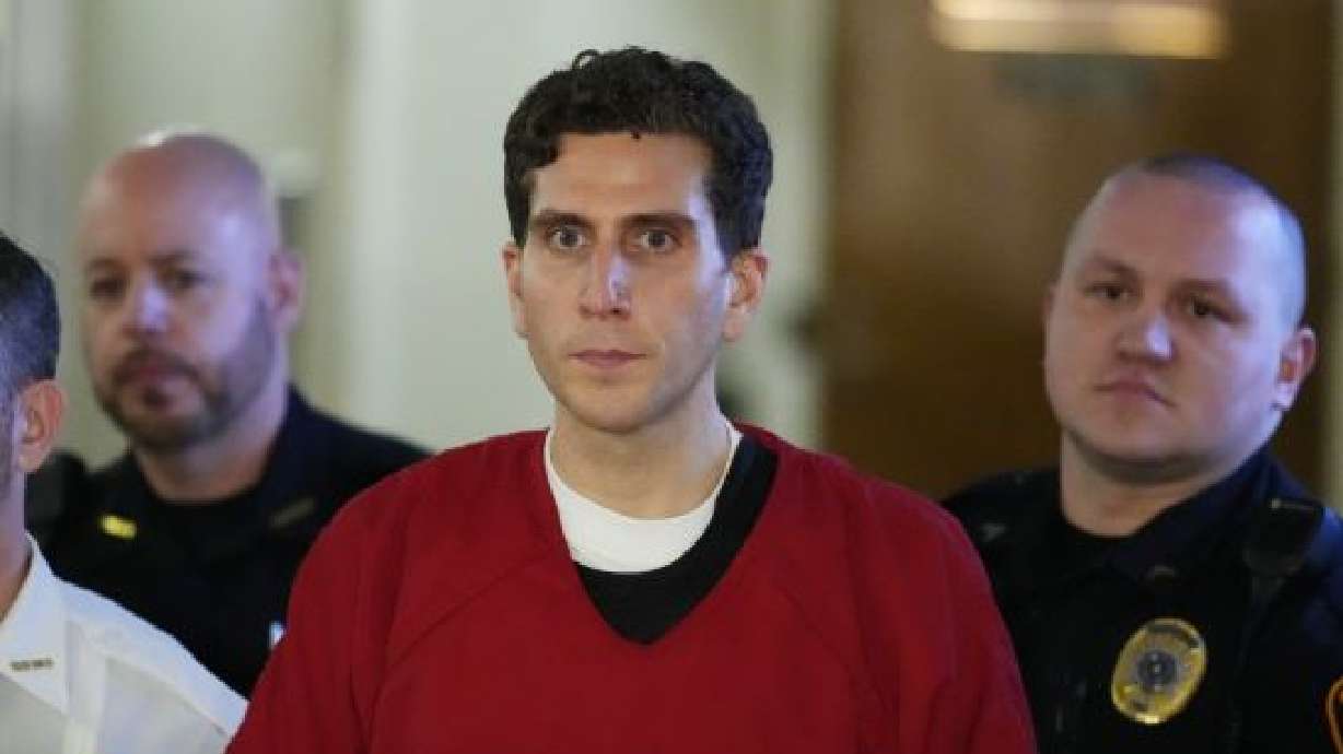 Bryan Kohberger, who is accused of killing four University of Idaho students, is escorted to an extradition hearing at the Monroe County Courthouse in Stroudsburg, Pa., Tuesday.