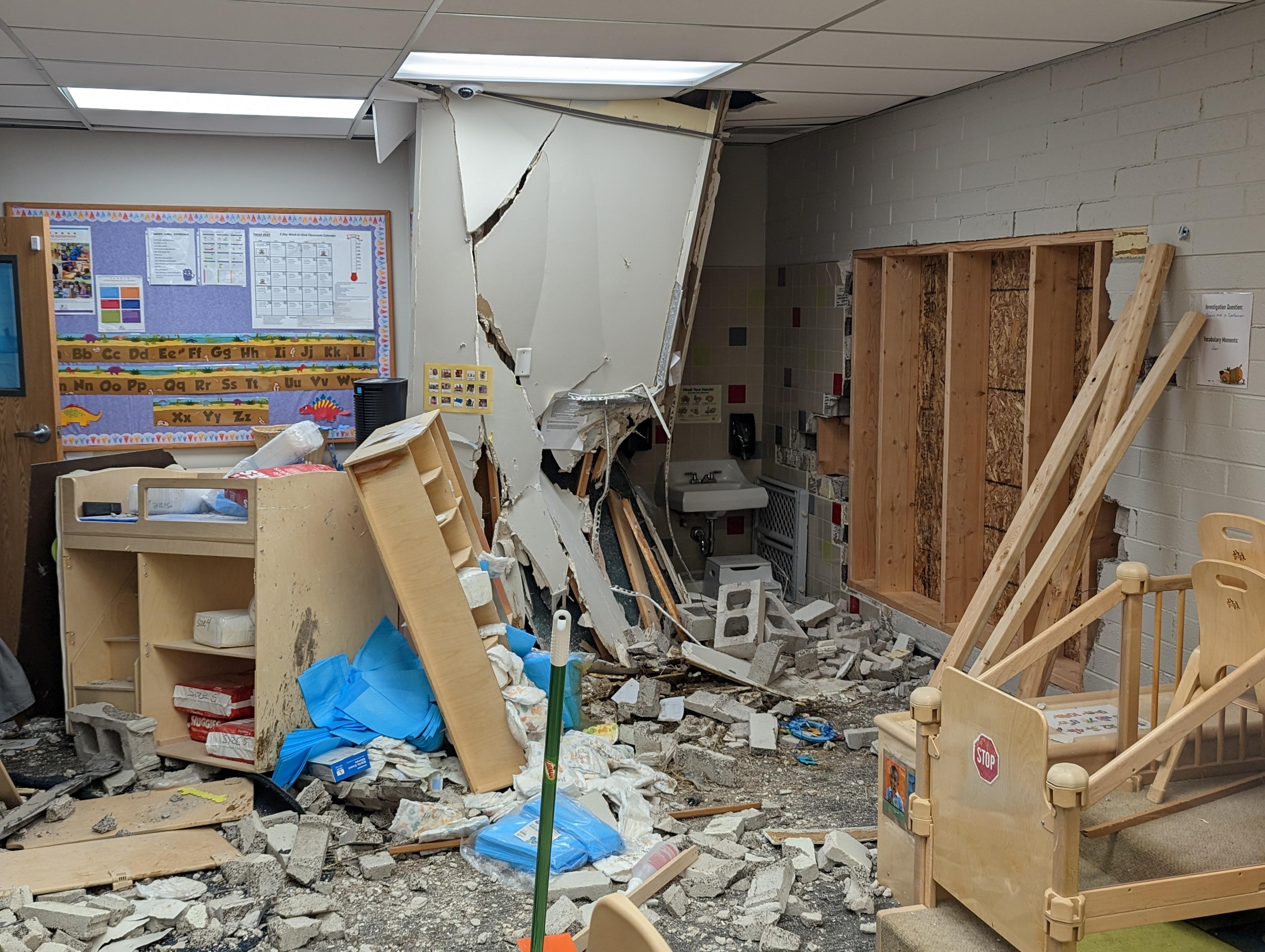 Damage is shown at the Kearns Early Childhood Head Start building after a suspected drunk driver crashed their car into it Saturday night.