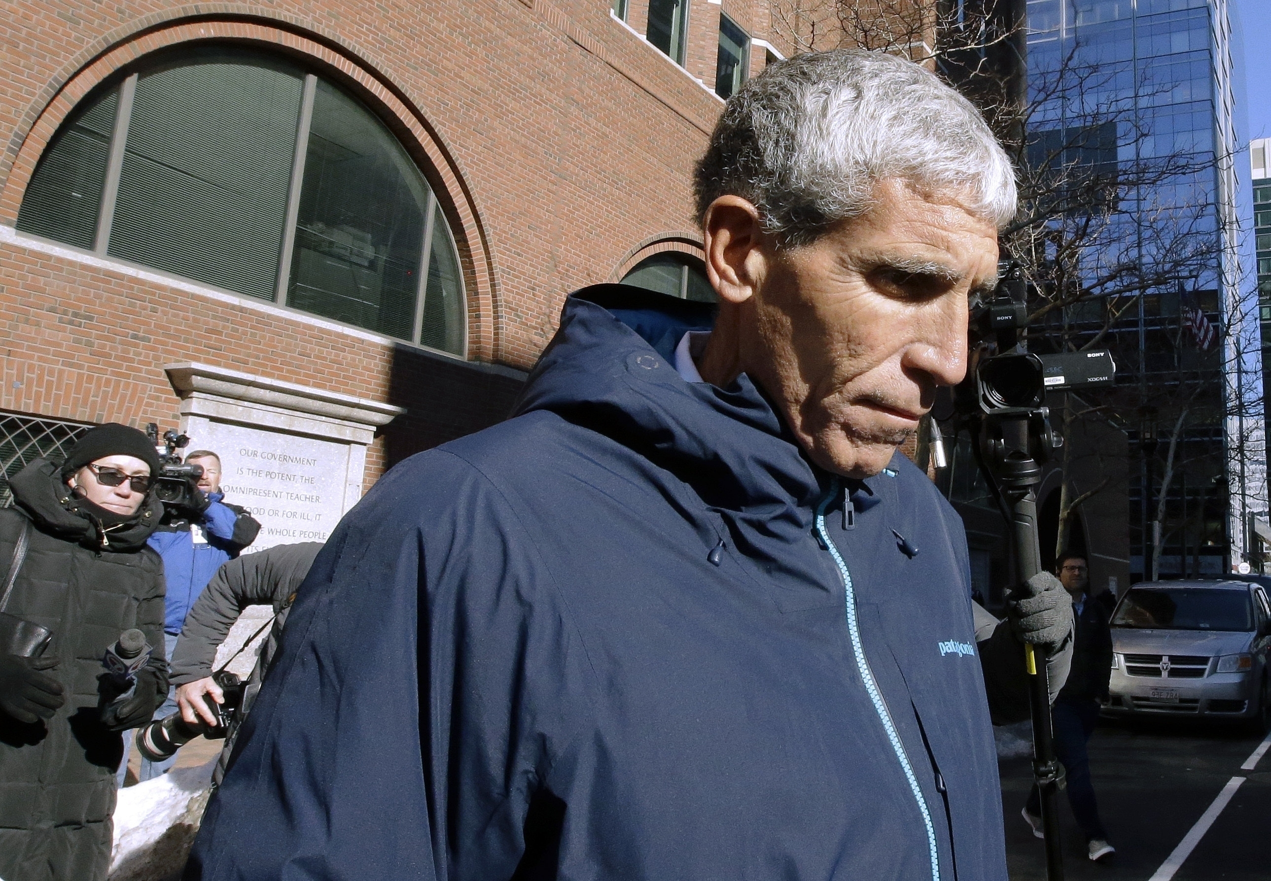 FILE - William "Rick" Singer founder of the Edge College & Career Network, departs federal court in Boston, on March 12, 2019. The mastermind of the nationwide college admissions bribery scandal is set to be sentenced on Wednesday, Jan. 4, 2023, after helping authorities secure the convictions of a slew of wealthy parents involved in his scheme to rig the selection process at top-tier schools.