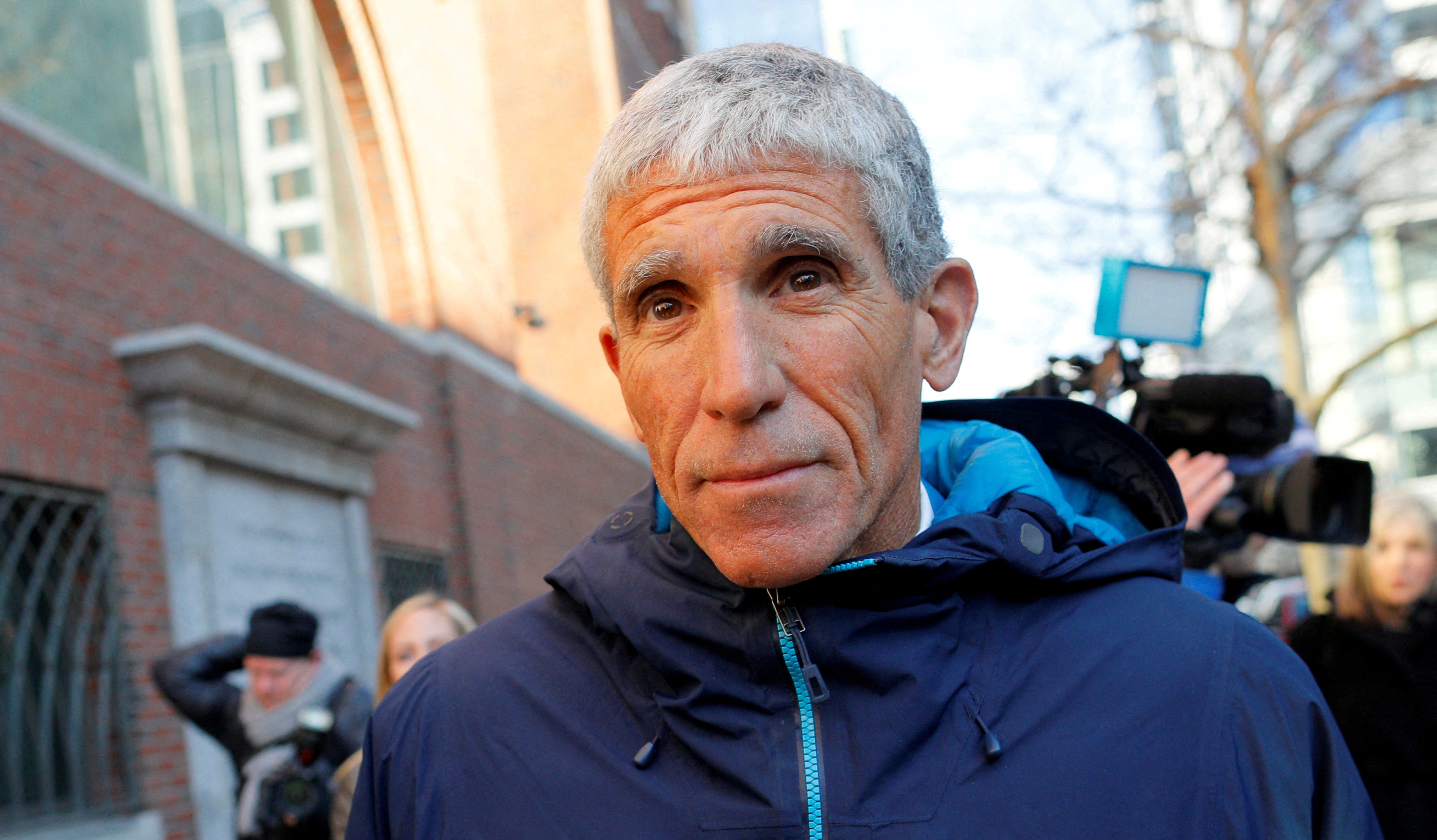 William "Rick" Singer leaves the federal courthouse after facing charges in a nationwide college admissions cheating scheme in Boston, Mass, March 12, 2019. He was sentenced to 3½ years in prison for helping wealthy parents secure the admission of their children to elite universities through cheating and bribery.