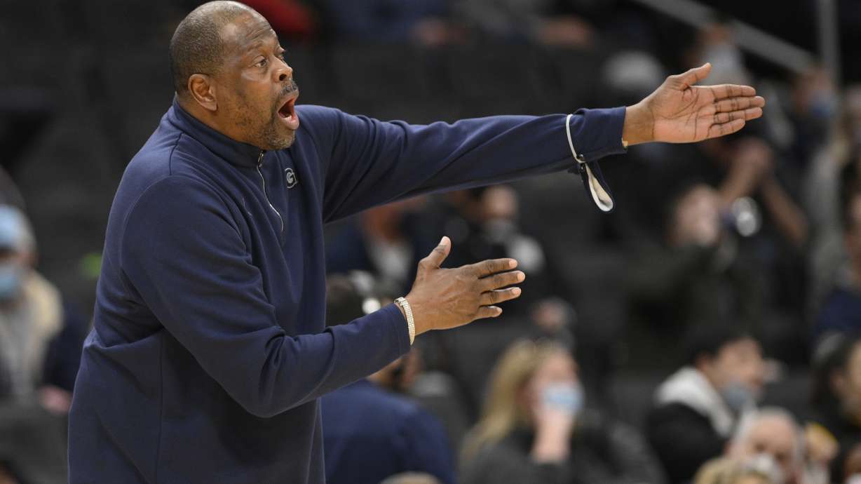 FILE - Georgetown head coach Patrick Ewing reacts during the first half of an NCAA college basketball game against Connecticut, Sunday, Feb. 27, 2022, in Washington. Georgetown basketball coach Patrick Ewing's loss-filled stint at his alma mater was called a “challenging and frustrating time" by athletic director Lee Reed, who added Wednesday, Jan. 4, 2023, that “no one is more committed” to turning things around than the former star center.