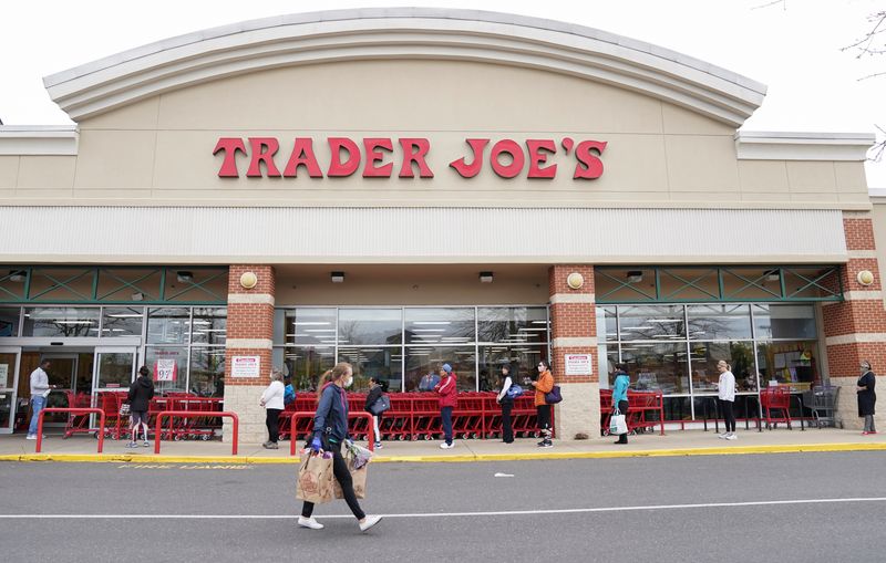 A shopper walks outside Trader Joe's in Bailey's Crossroads, Virginia, March 31, 2020. The store is accused of selling dark chocolate that contains harmful levels of lead and cadmium.